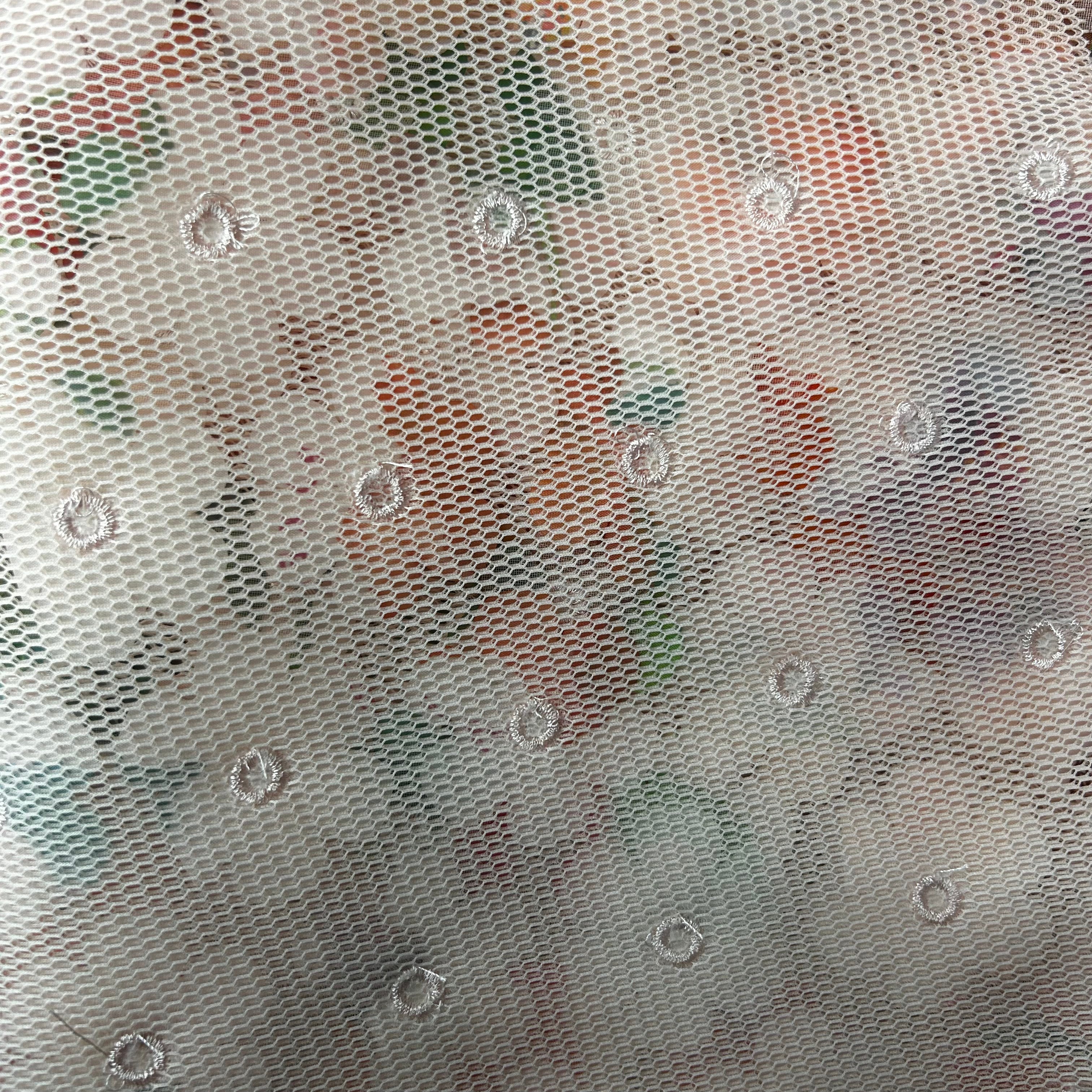 Close-up of a textured fabric with a subtle pattern