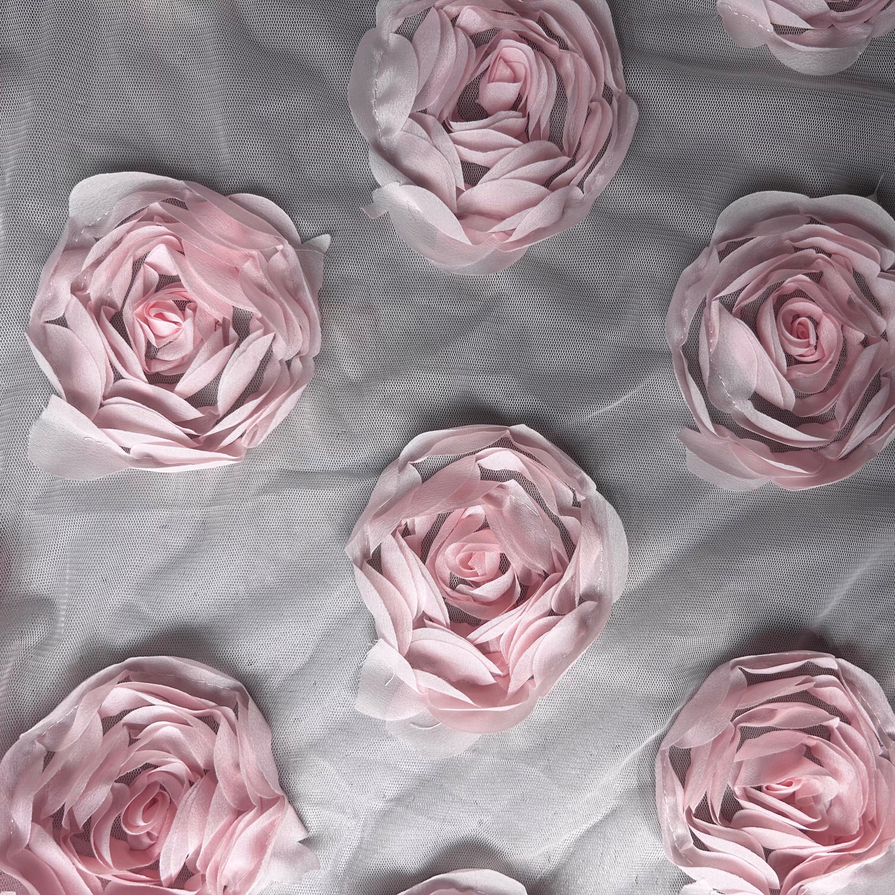 Pattern of pink roses on a light gray background