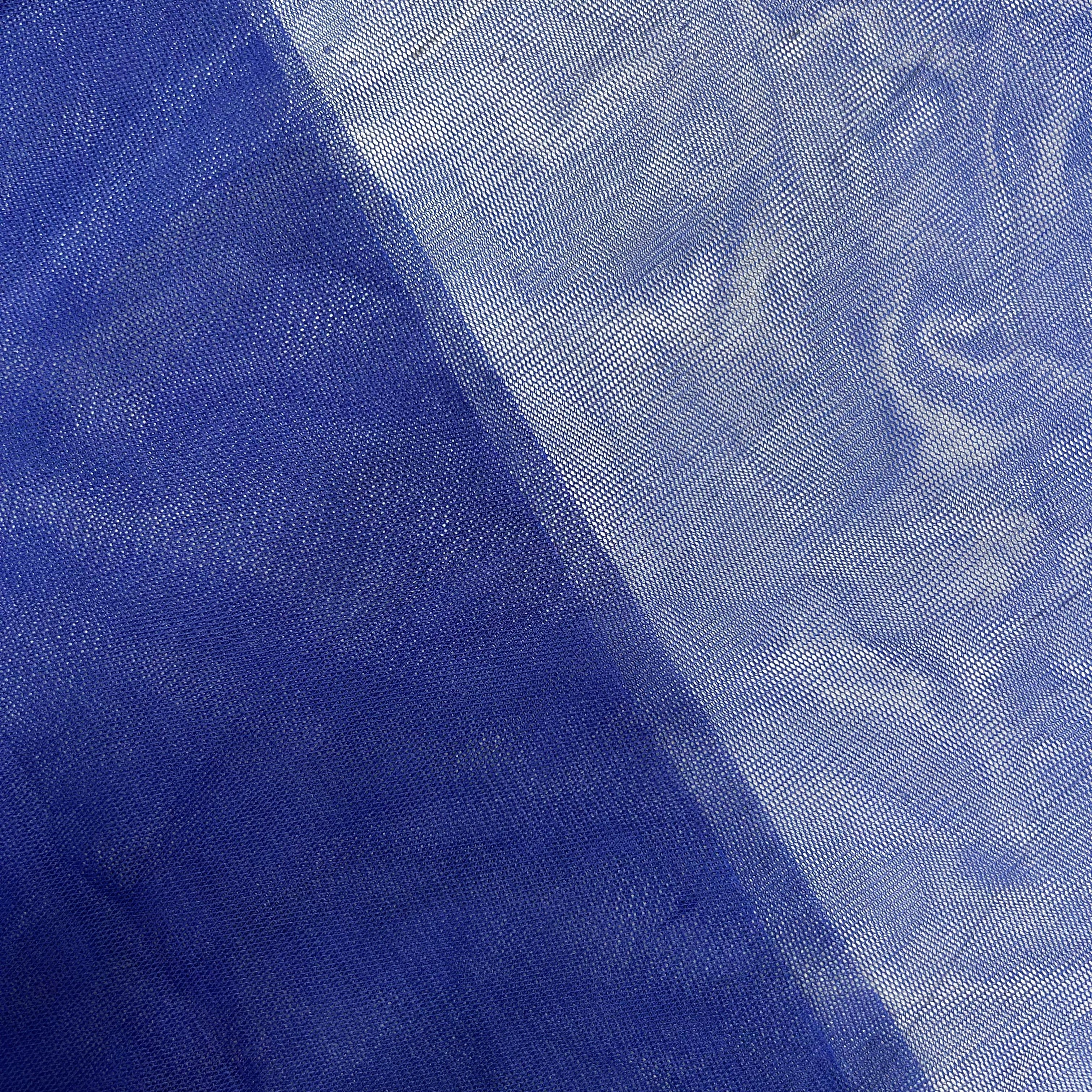 Close-up of blue fabric with a textured pattern