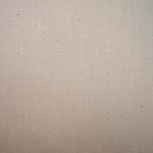 A plain beige cotton calico fabric占满整个画面。