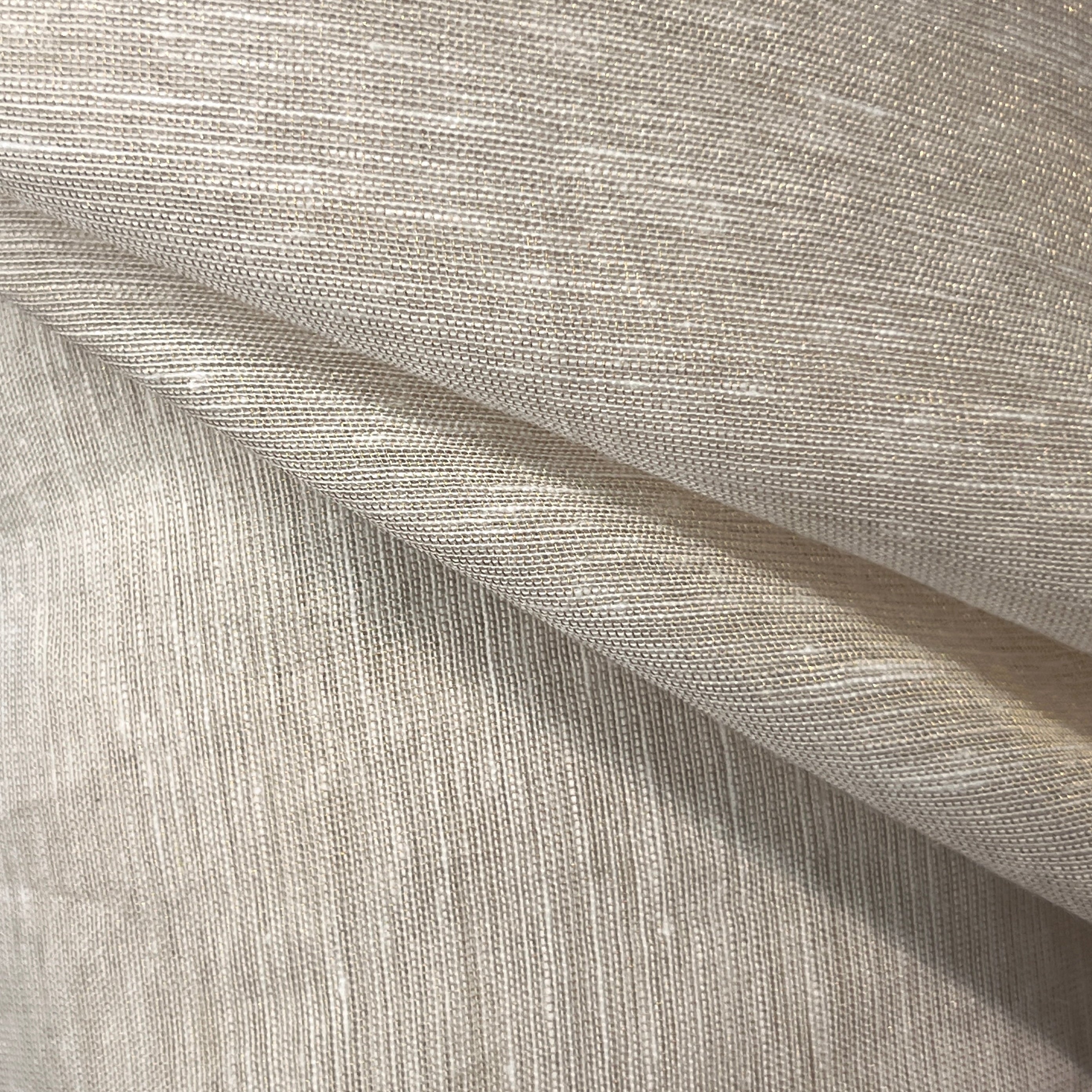 Close-up of textured gray fabric with a subtle pattern