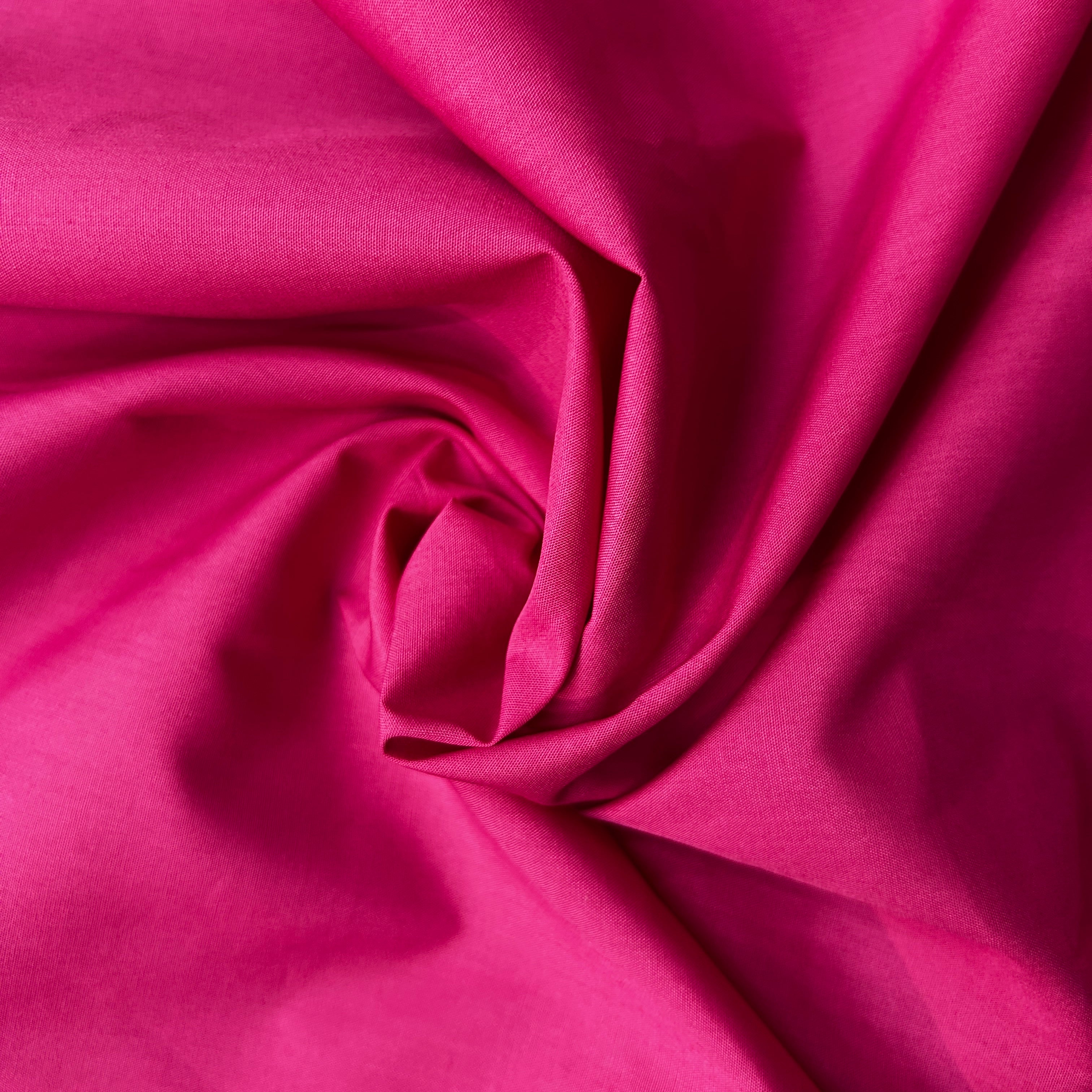 Close-up of pink fabric with folds