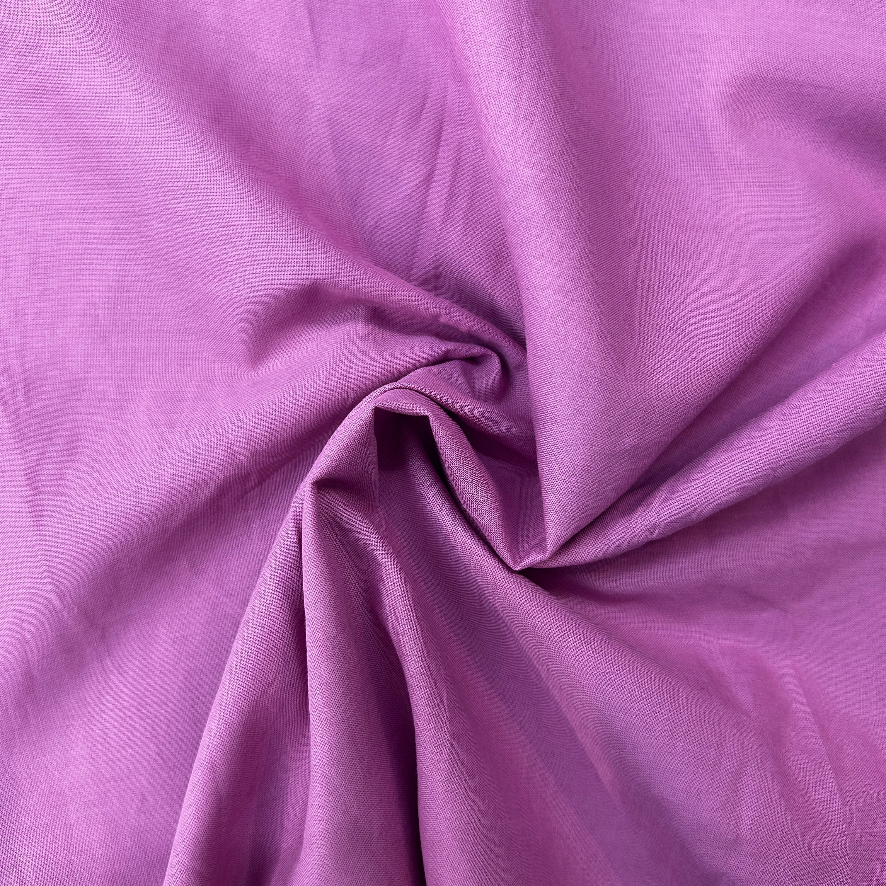 Close-up of purple fabric with folds