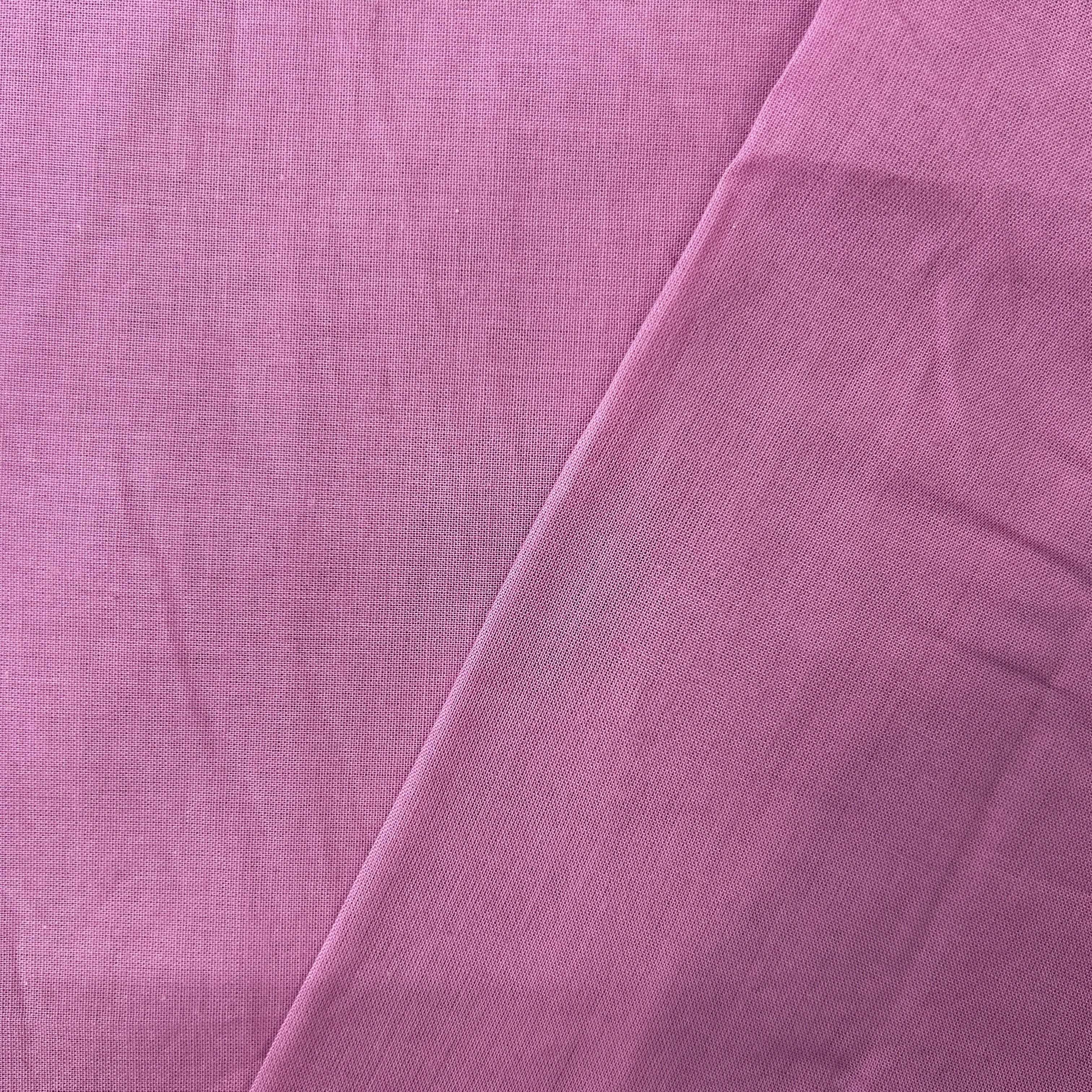 Close-up of purple fabric with a slight texture