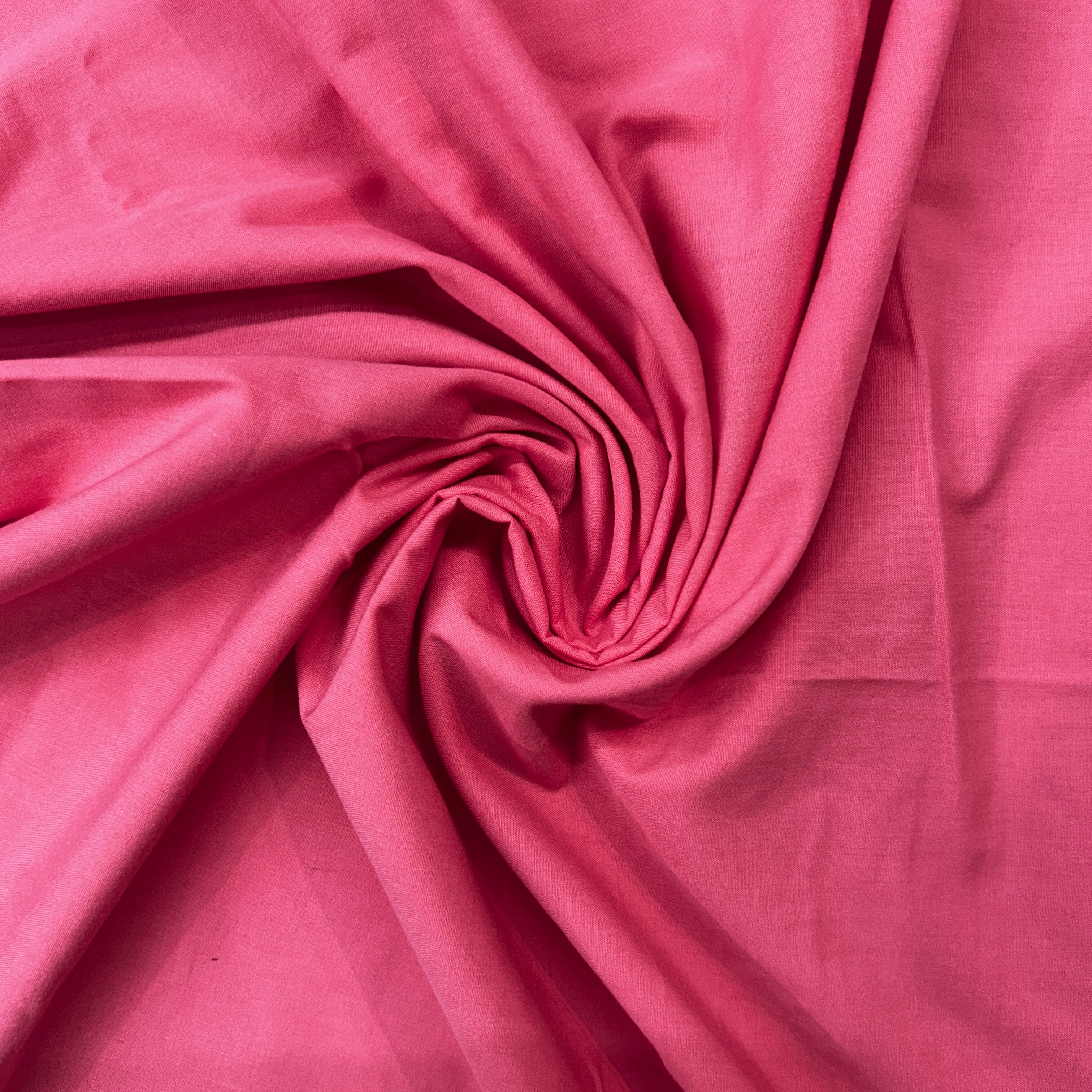 Close-up of pink fabric with folds