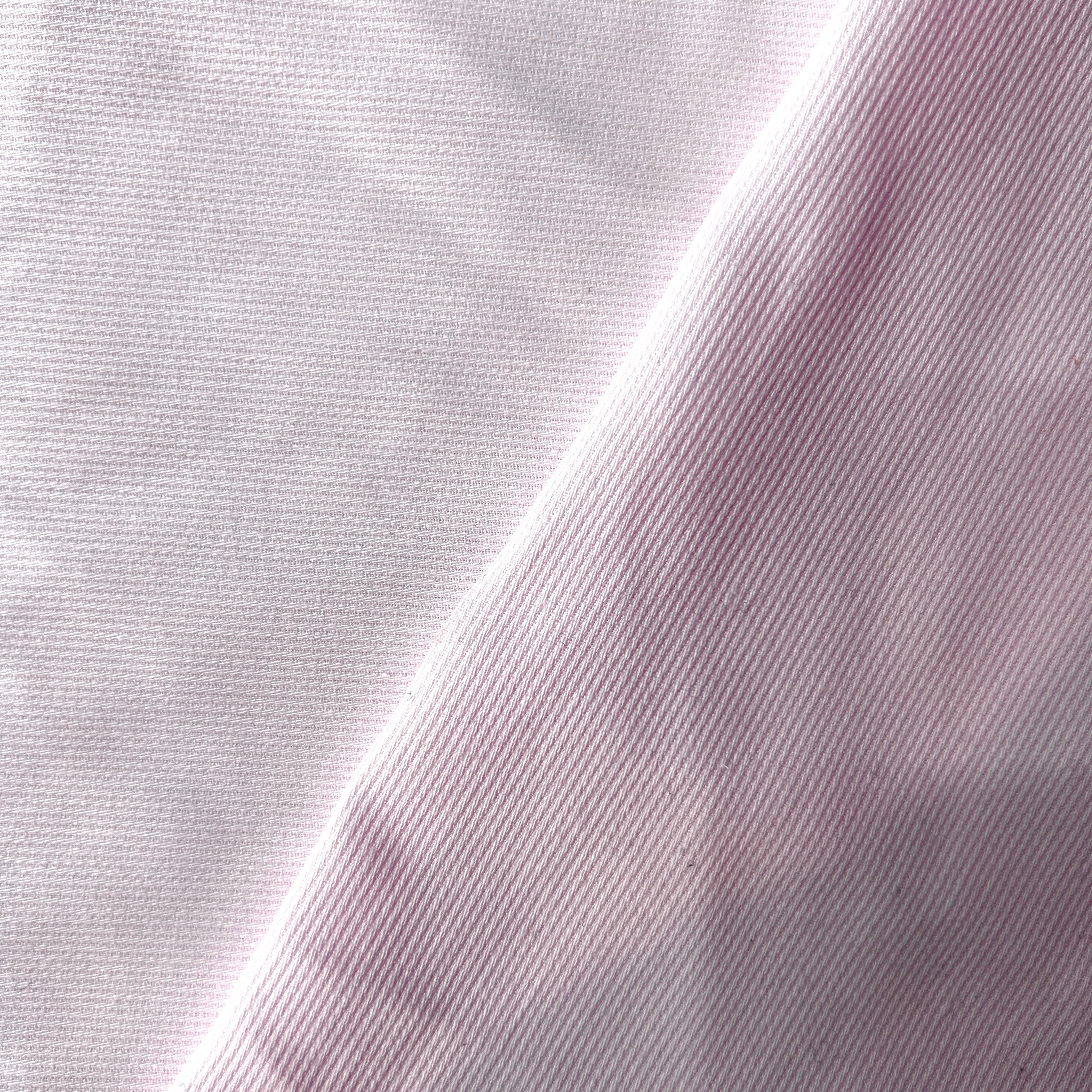 Close-up of light purple fabric texture