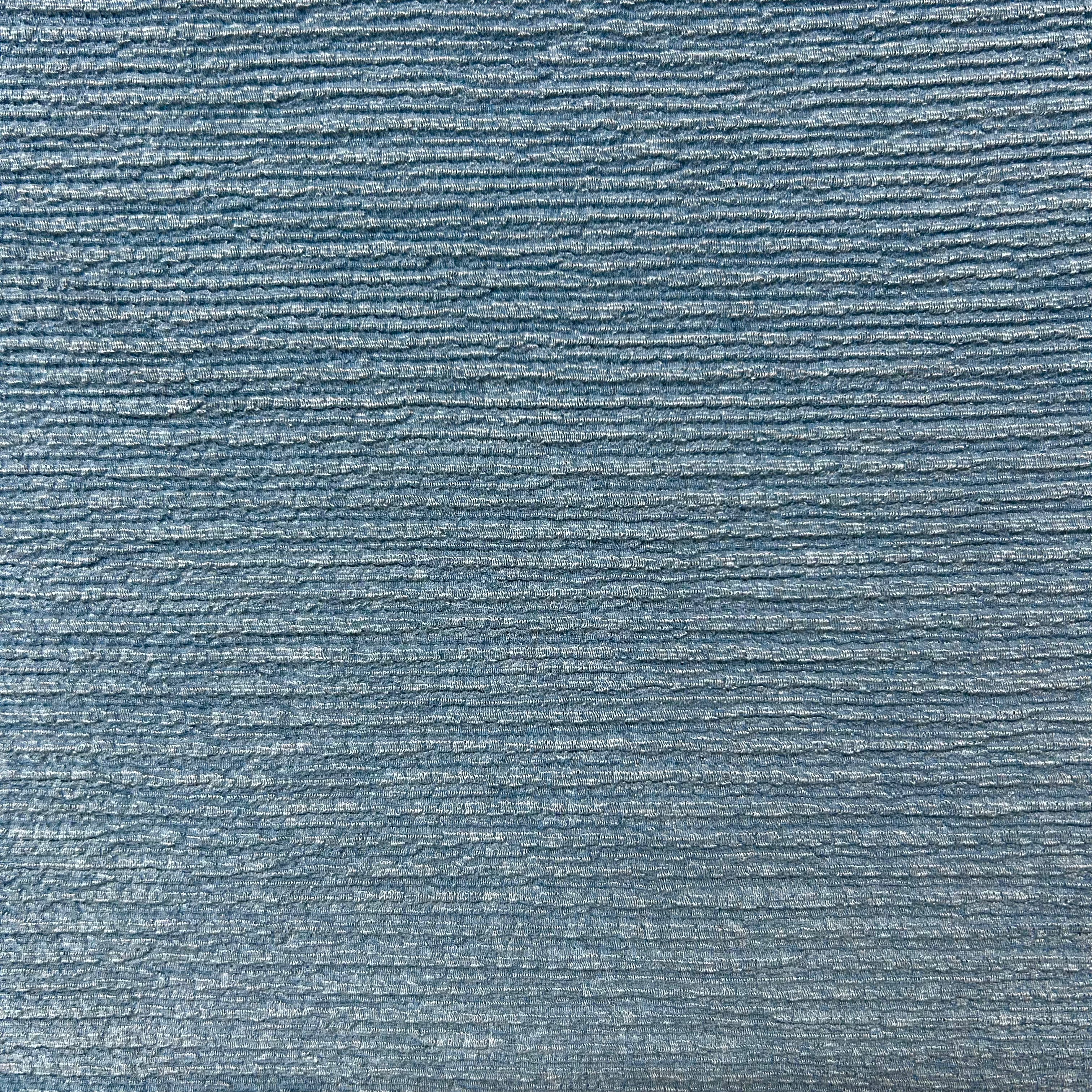 Textured blue fabric pattern