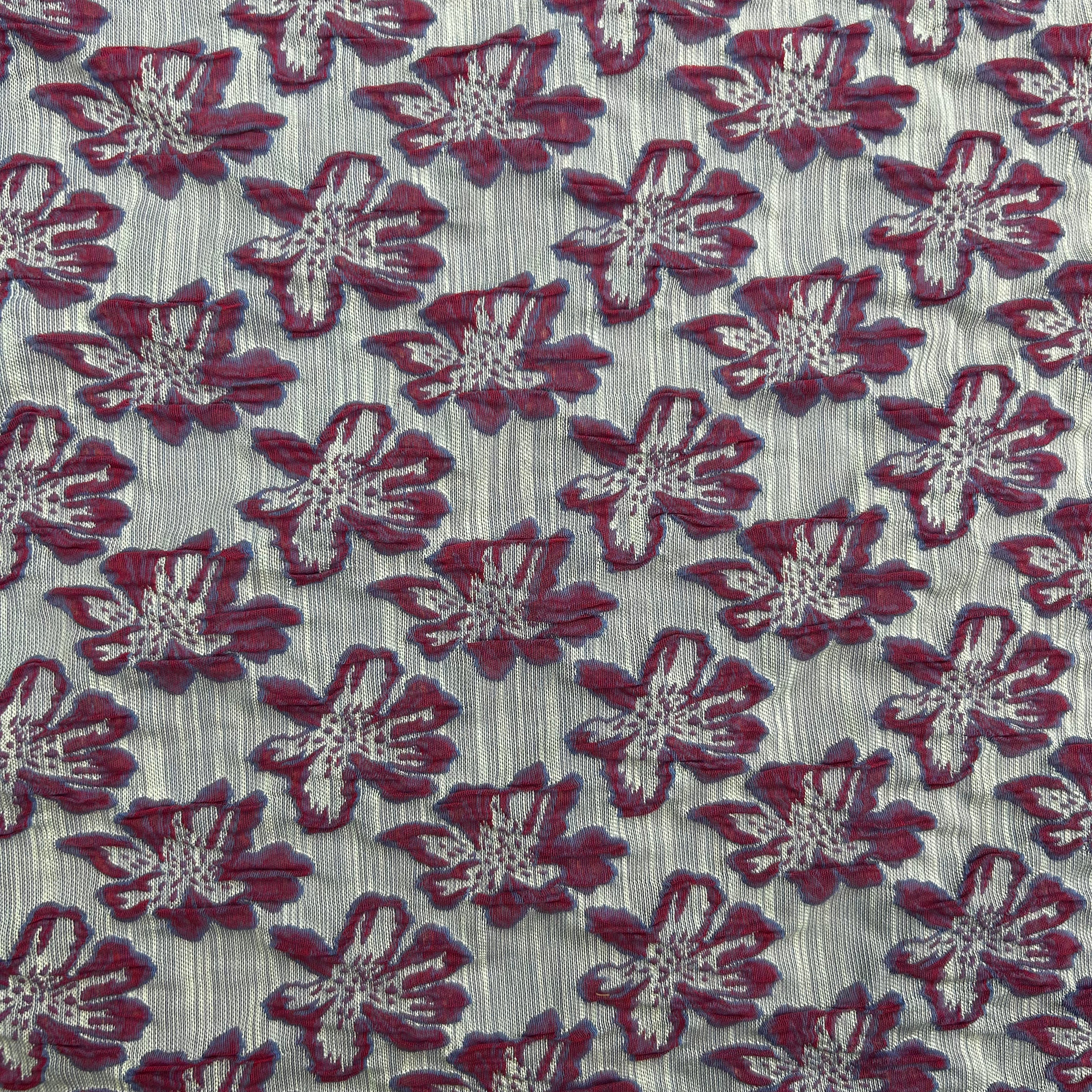 Pattern of red flowers on a gray background