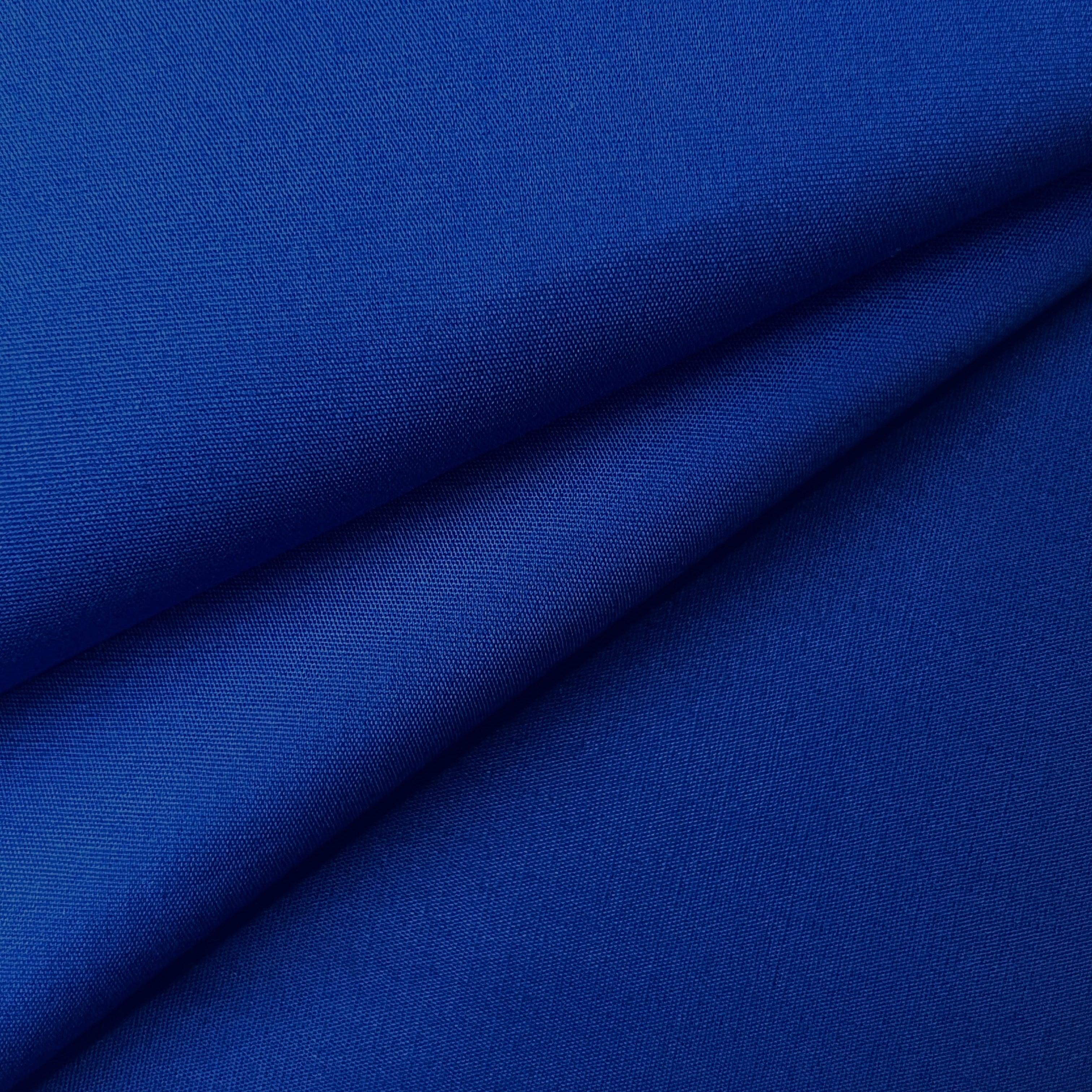 Navy blue 100% cotton poplin fabric with a plain weave texture, folded to show depth.