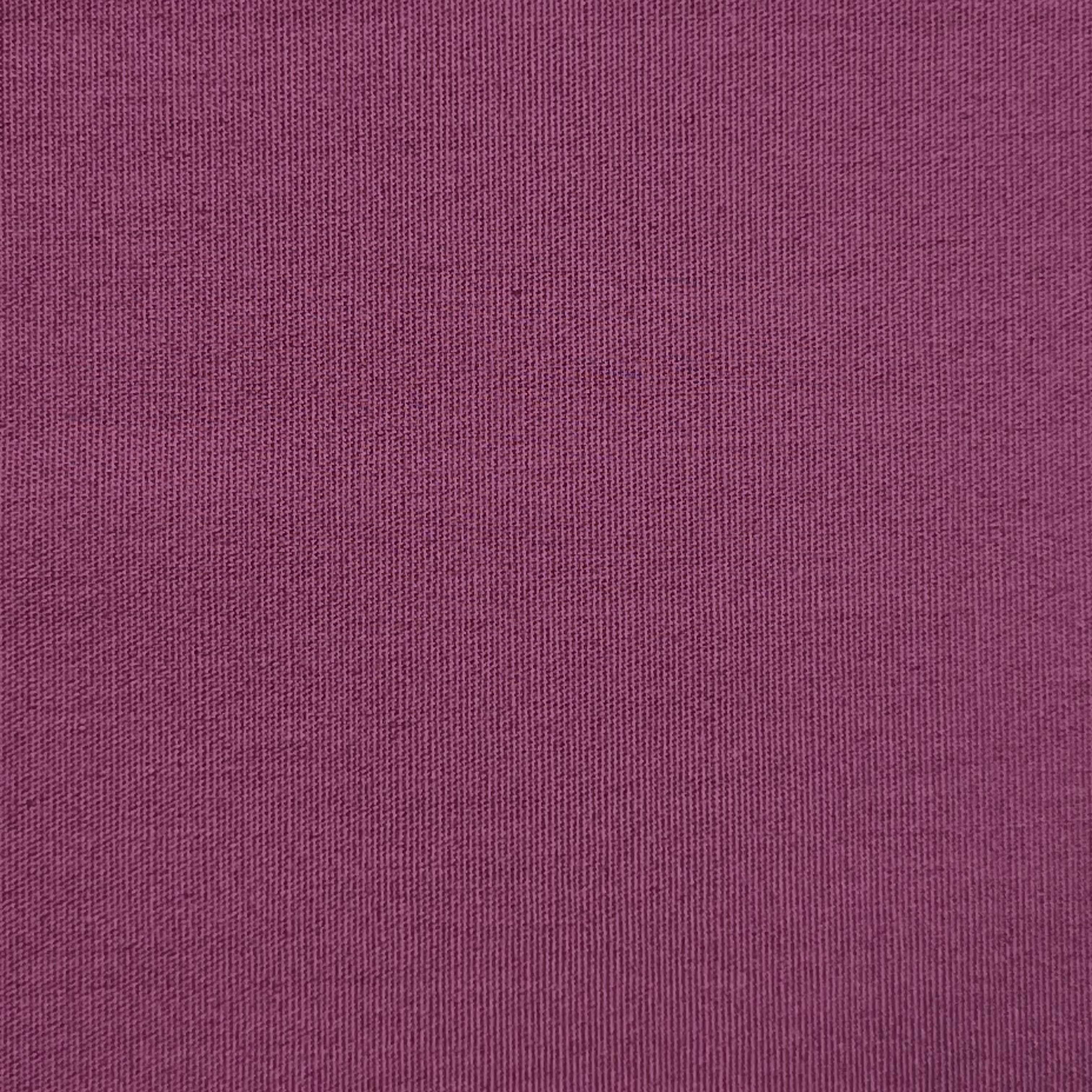 Close-up of a solid plum-colored cotton poplin fabric with a fine, smooth weave.