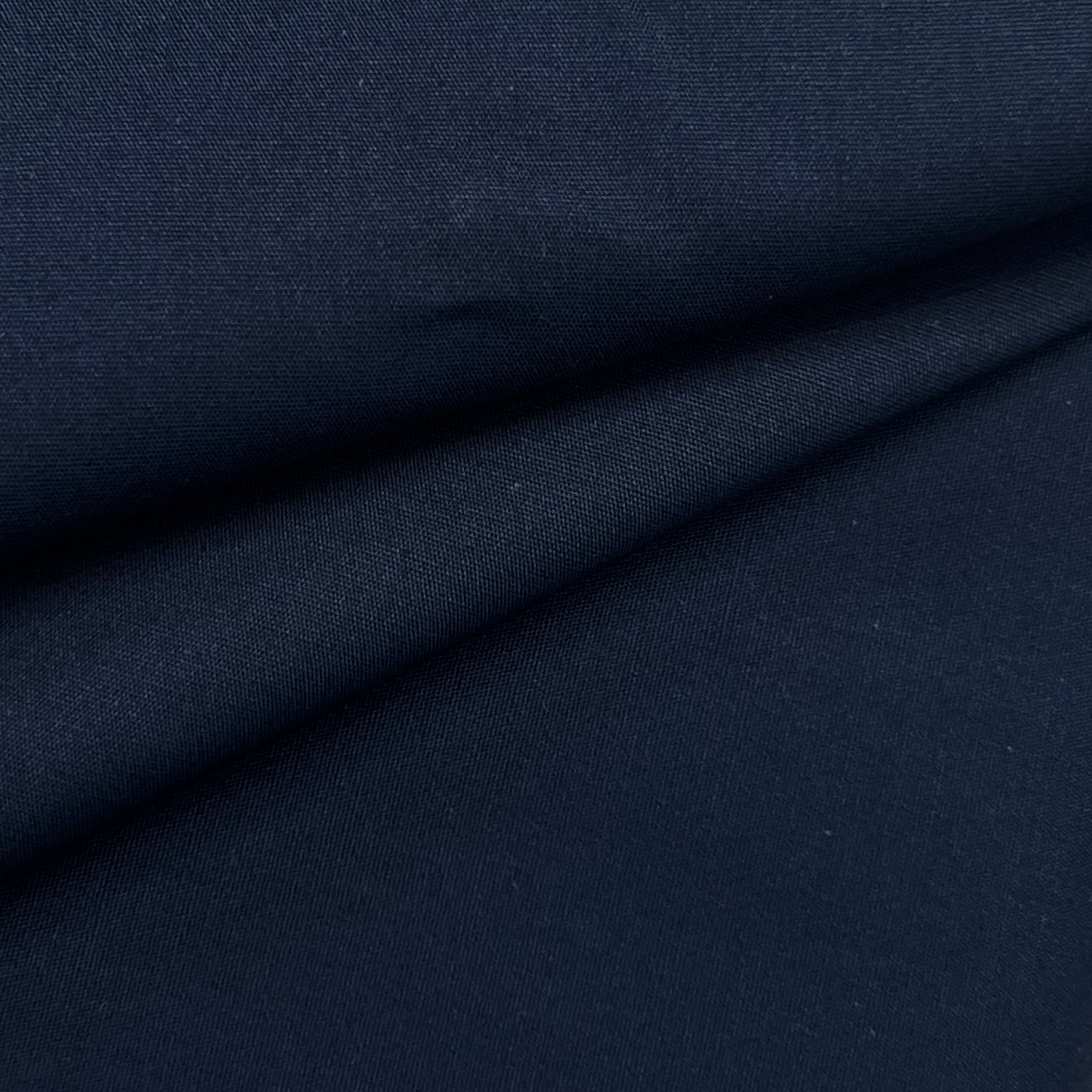 Dark navy blue cotton poplin fabric with a visible weave.