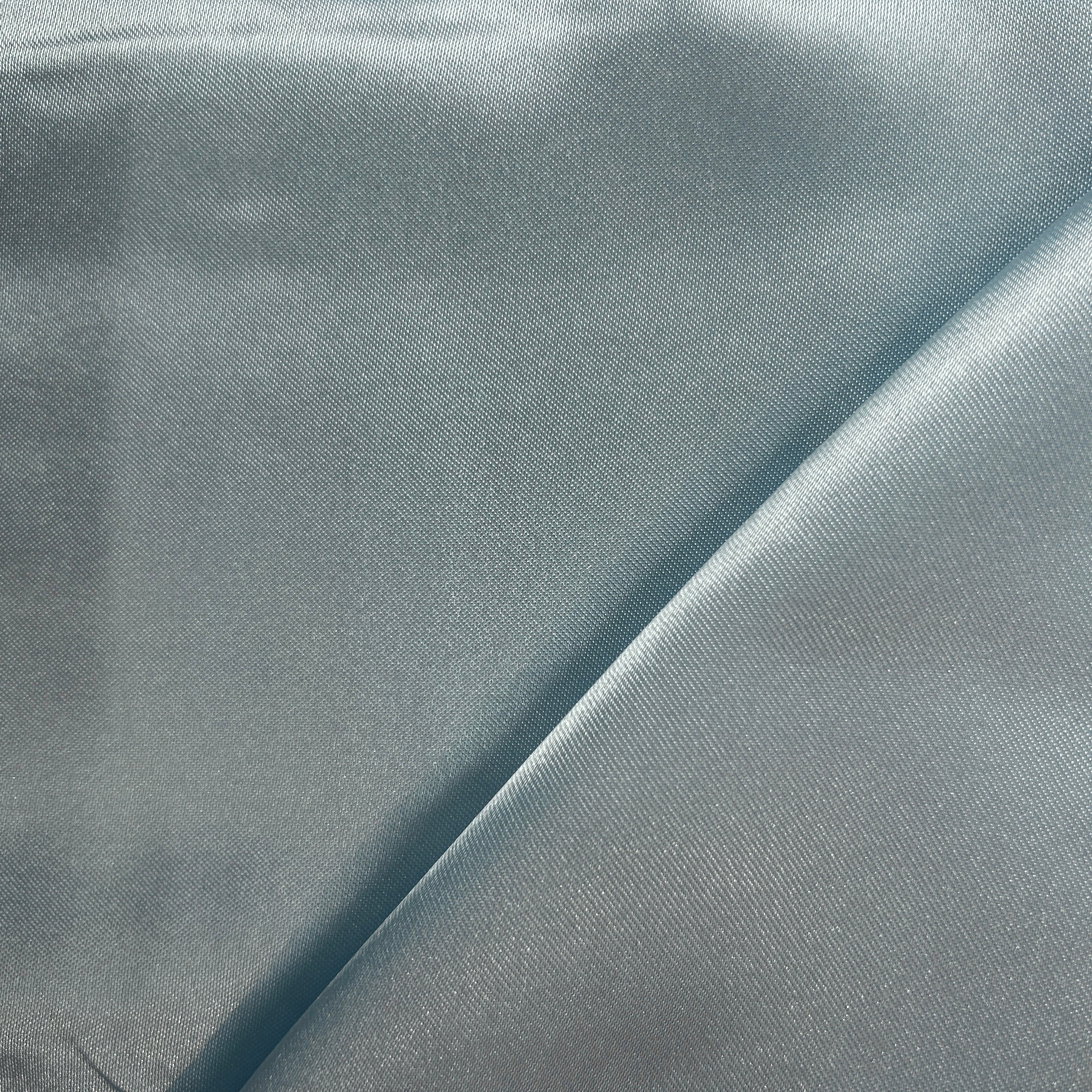 Close-up of gray fabric with a subtle texture