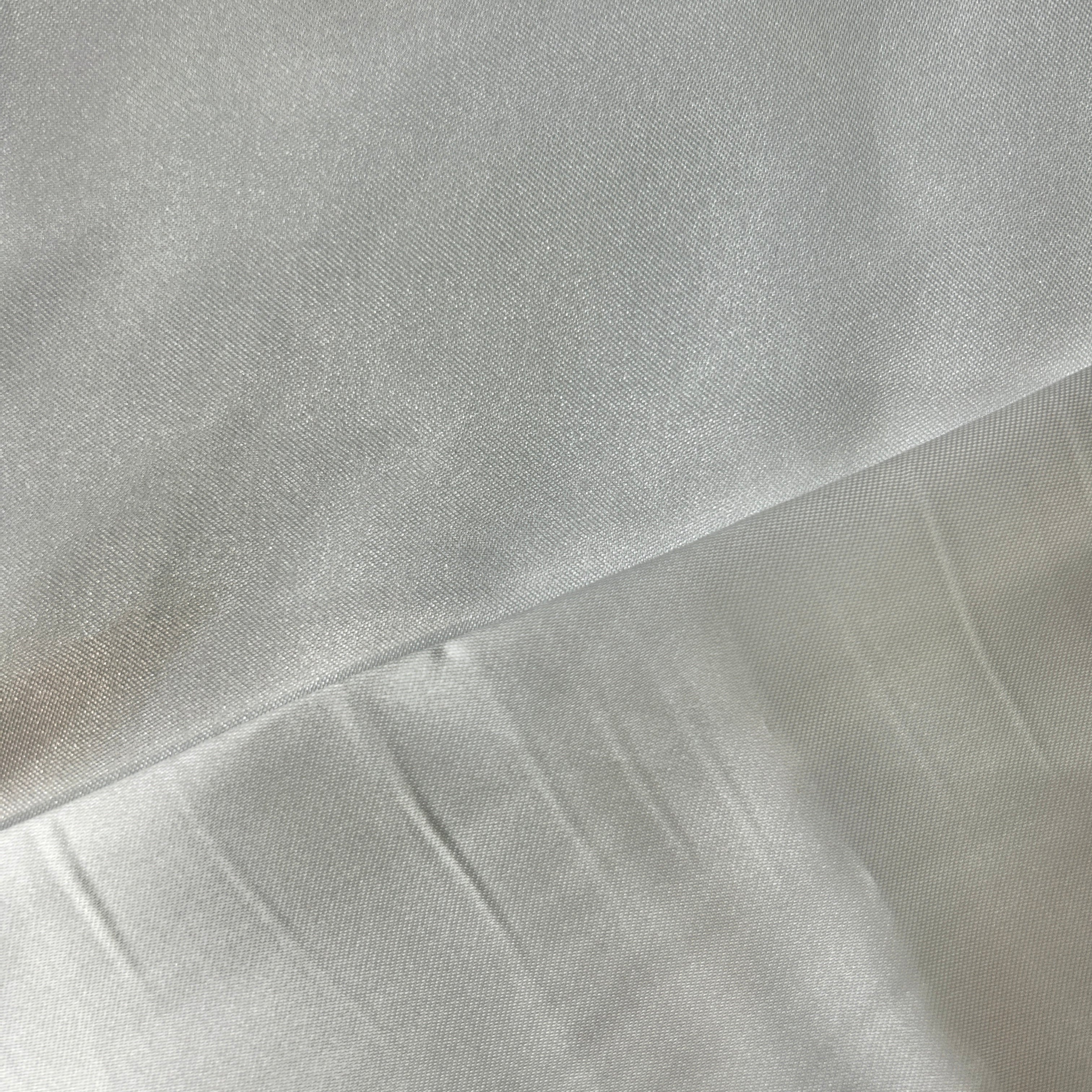 Close-up of a textured gray fabric surface