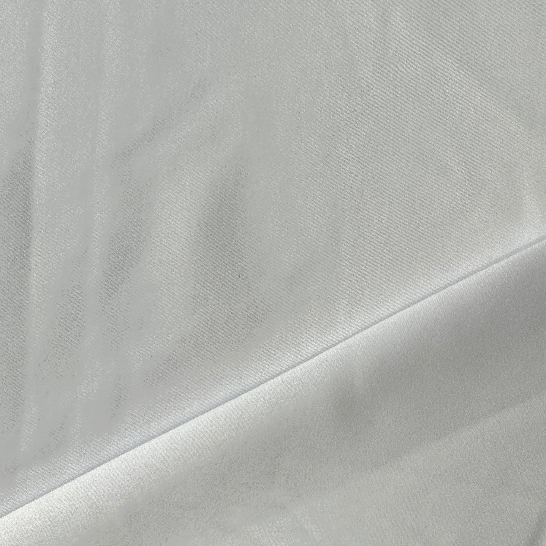 Close-up of gray fabric with a subtle texture