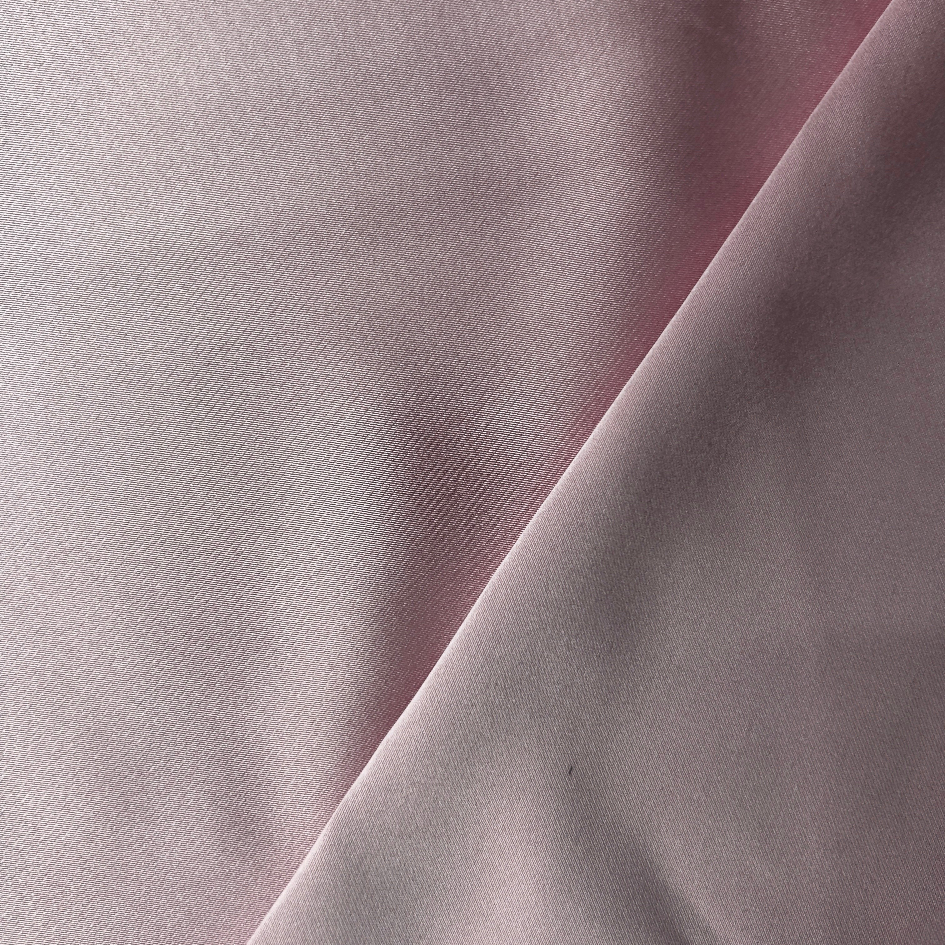 Close-up of gray fabric with a subtle texture