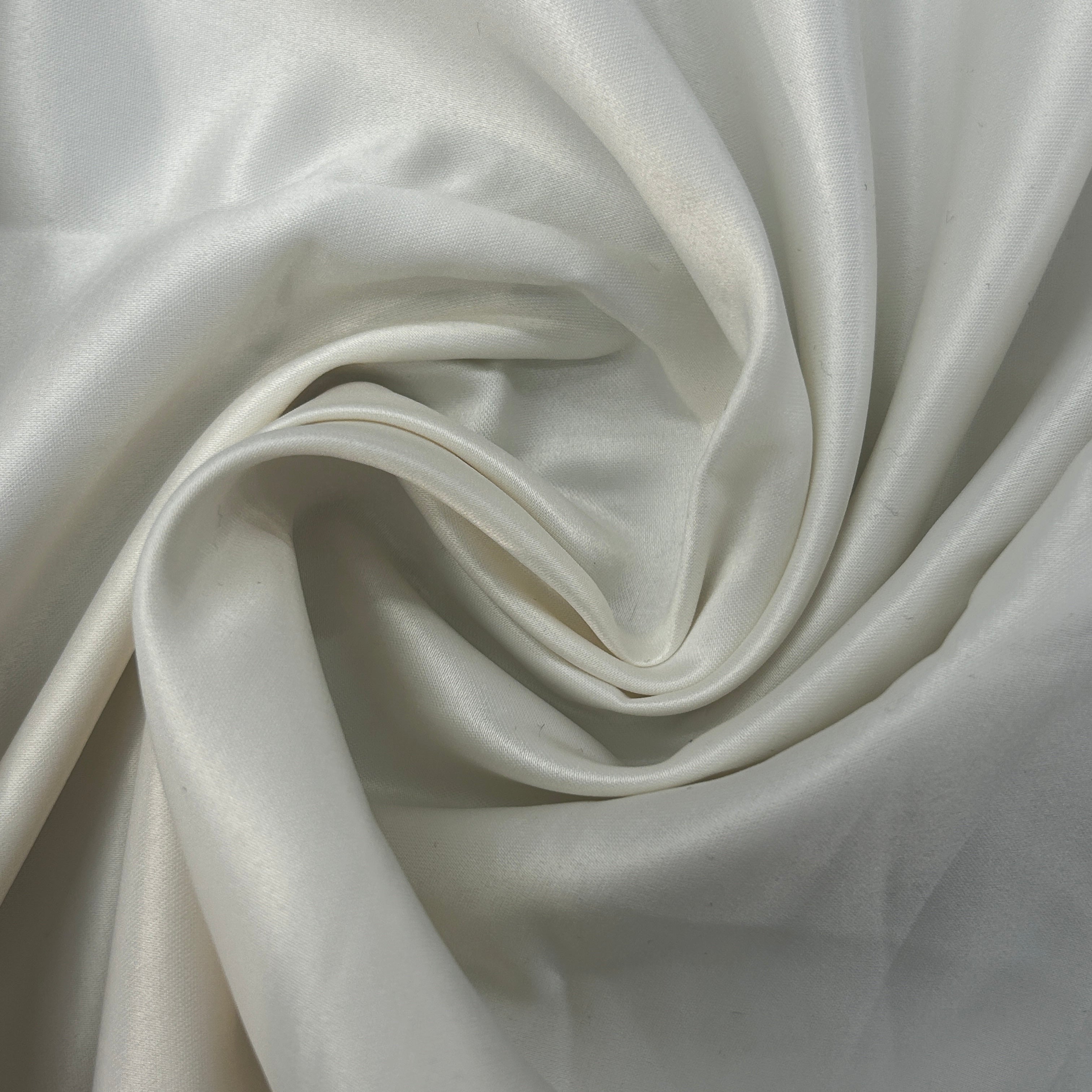 Close-up of white fabric with folds