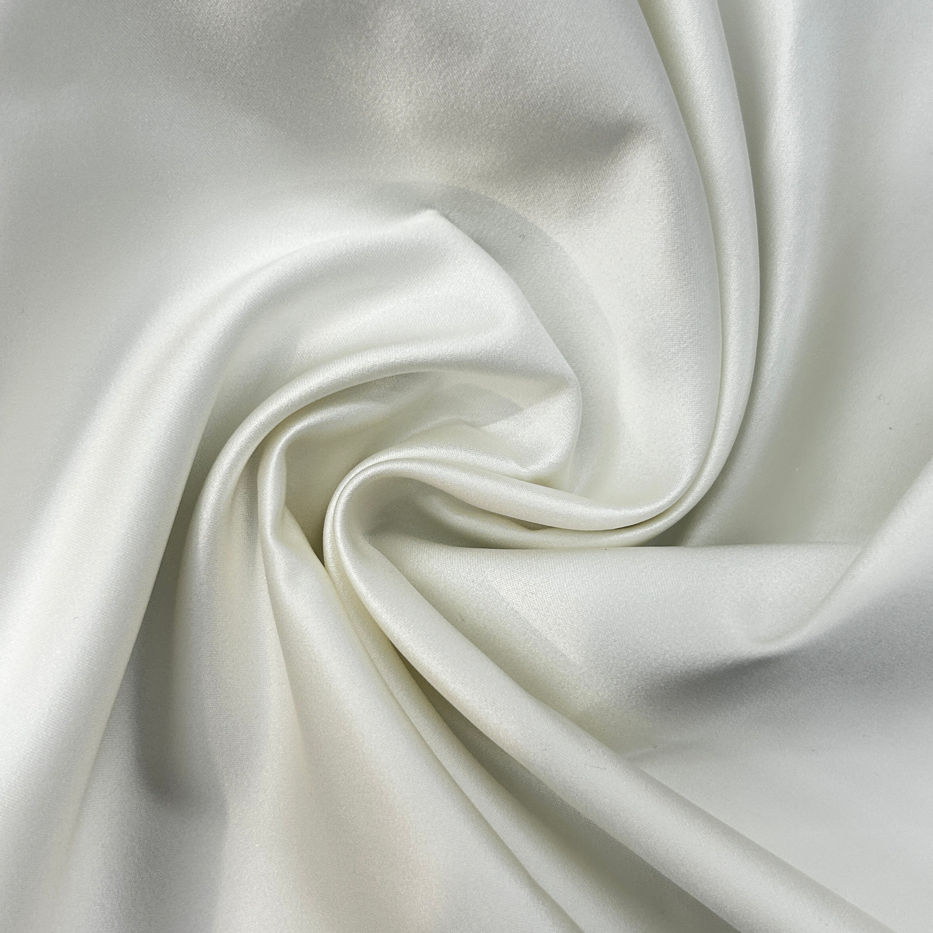 Close-up of white fabric with folds
