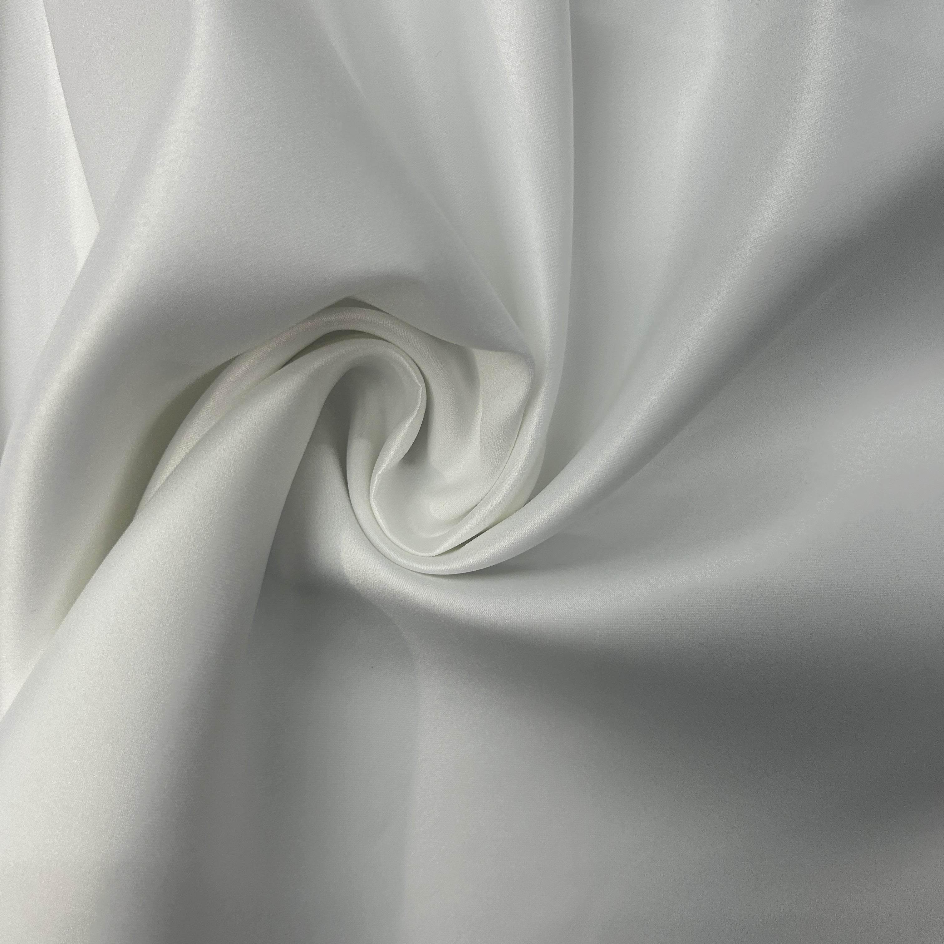 Close-up of white fabric with folds