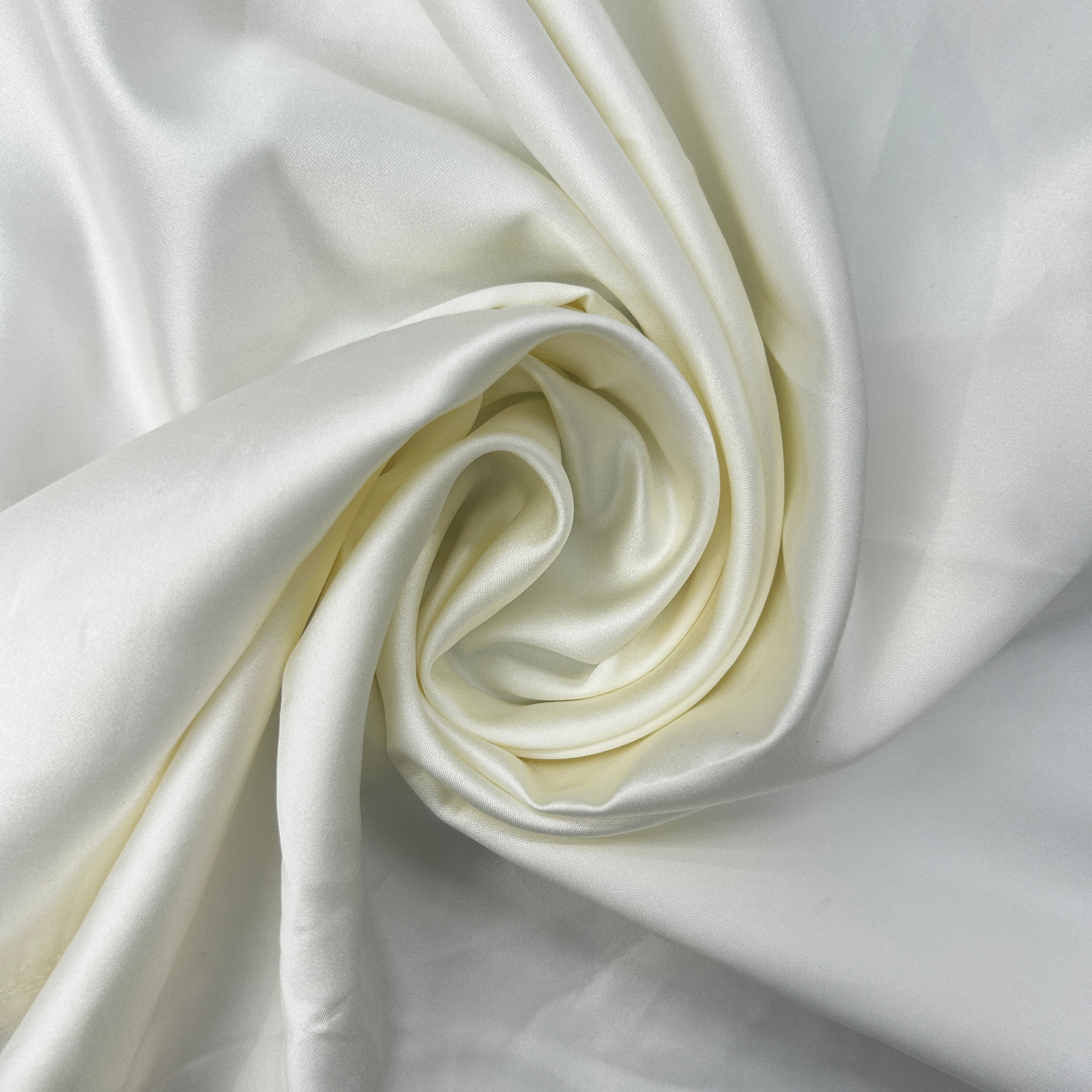Close-up of white fabric with folds