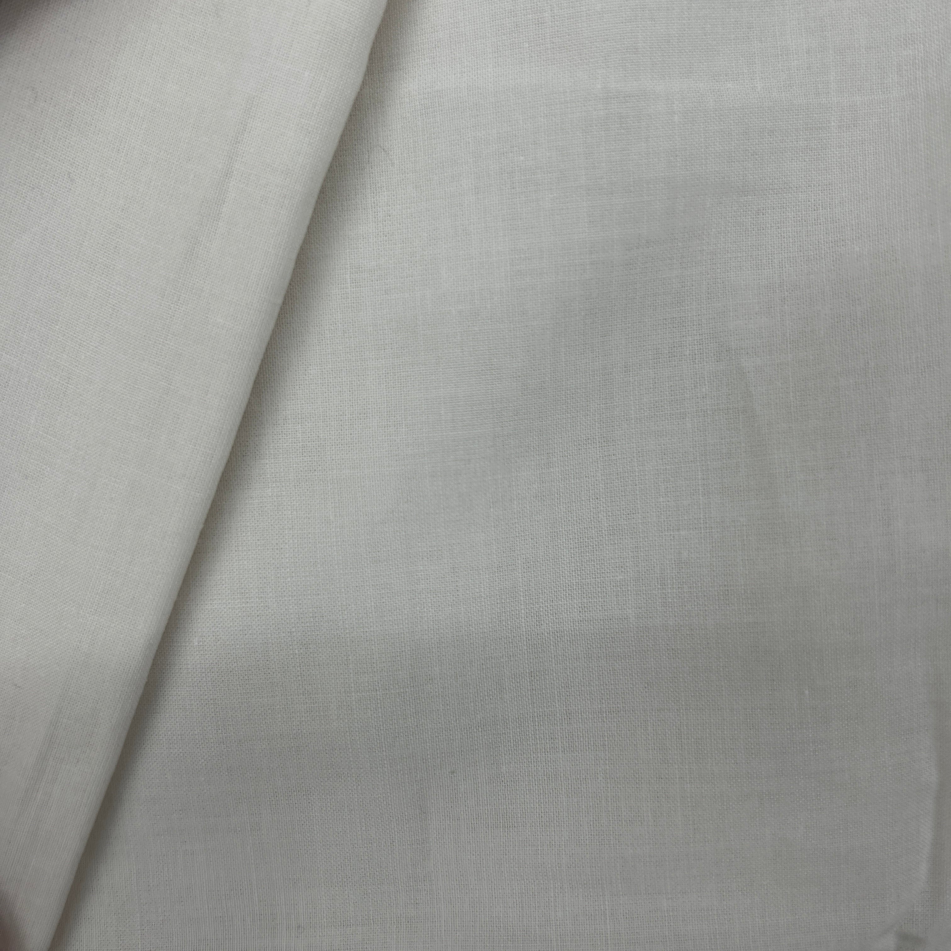 A close-up of light gray fabric with a subtle woven texture and soft folds.