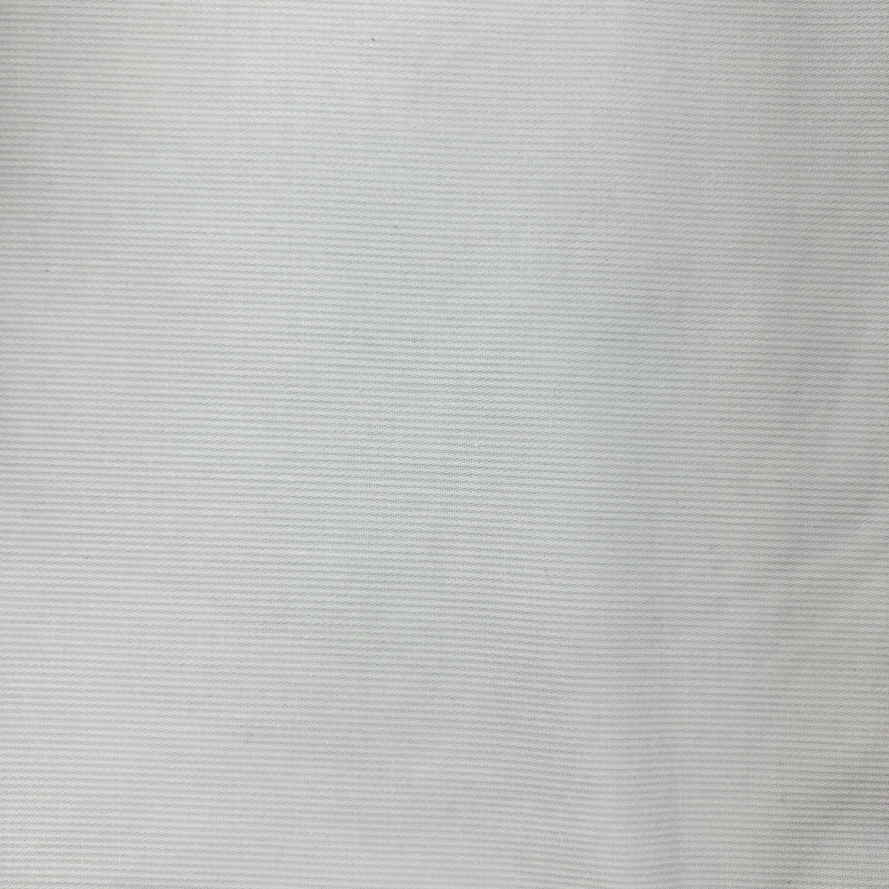 A close-up of a light gray ribbed fabric texture.