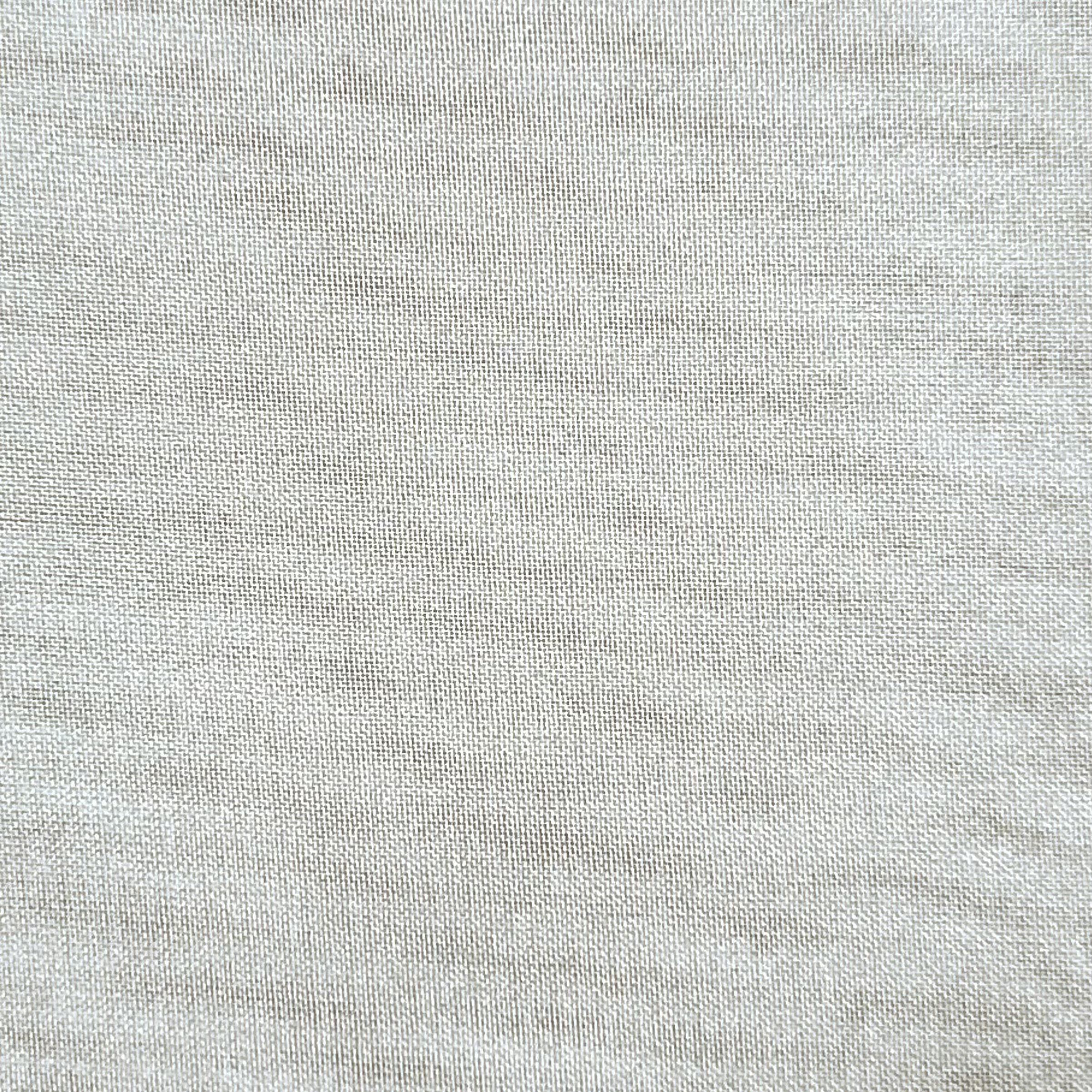 Close-up of high-quality ultra-thin polyester chiffon fabric in a light grey color.