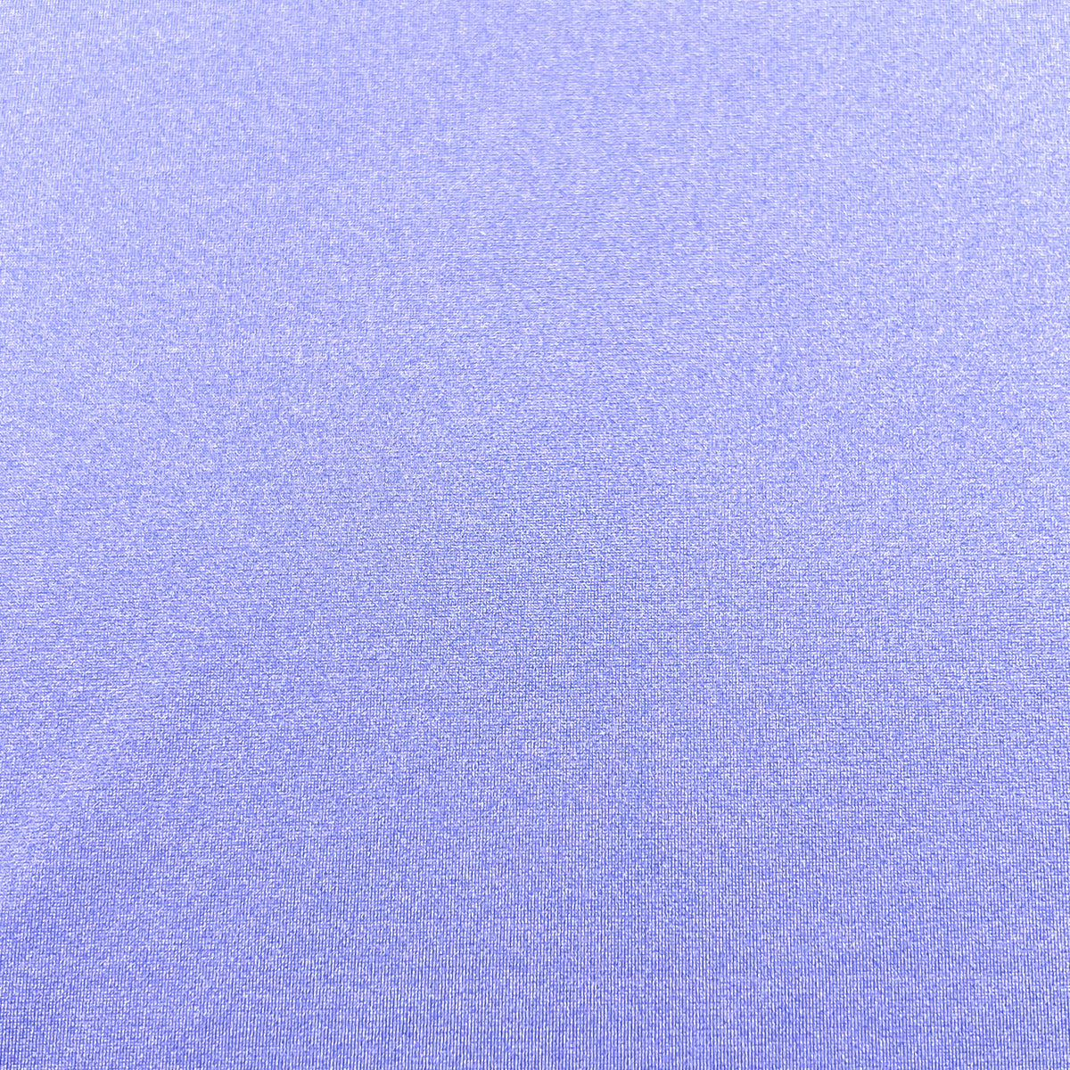 A close-up of a textured lavender-purple fabric with a fine, slightly shimmering weave.