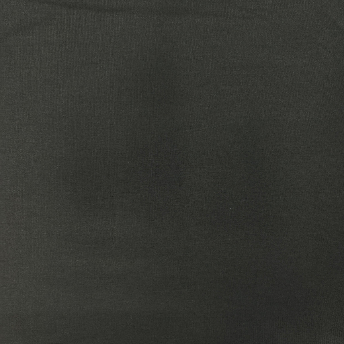 A close-up of a dark charcoal gray or black textured fabric surface.