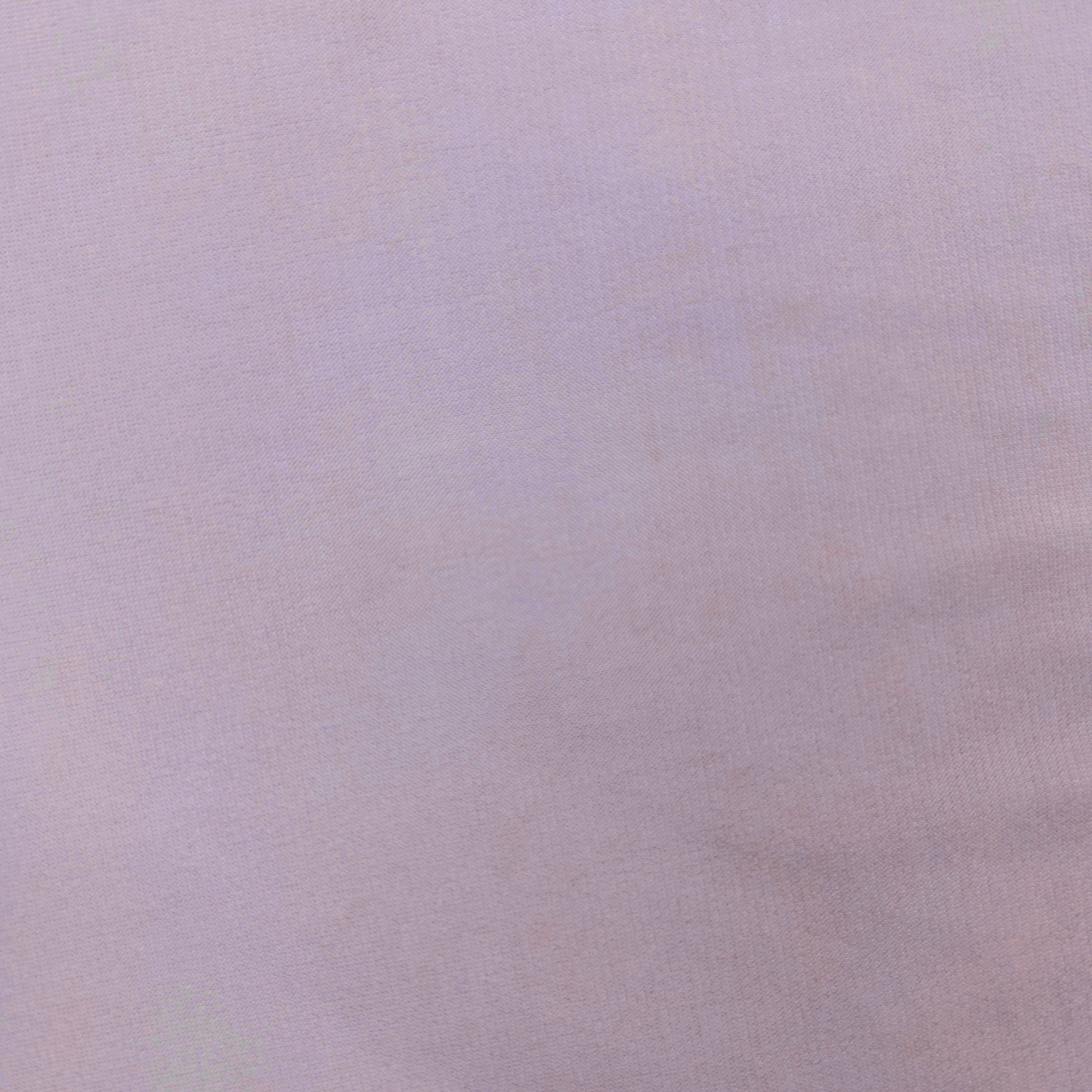 A close-up of a light lavender or pale purple textured fabric surface.