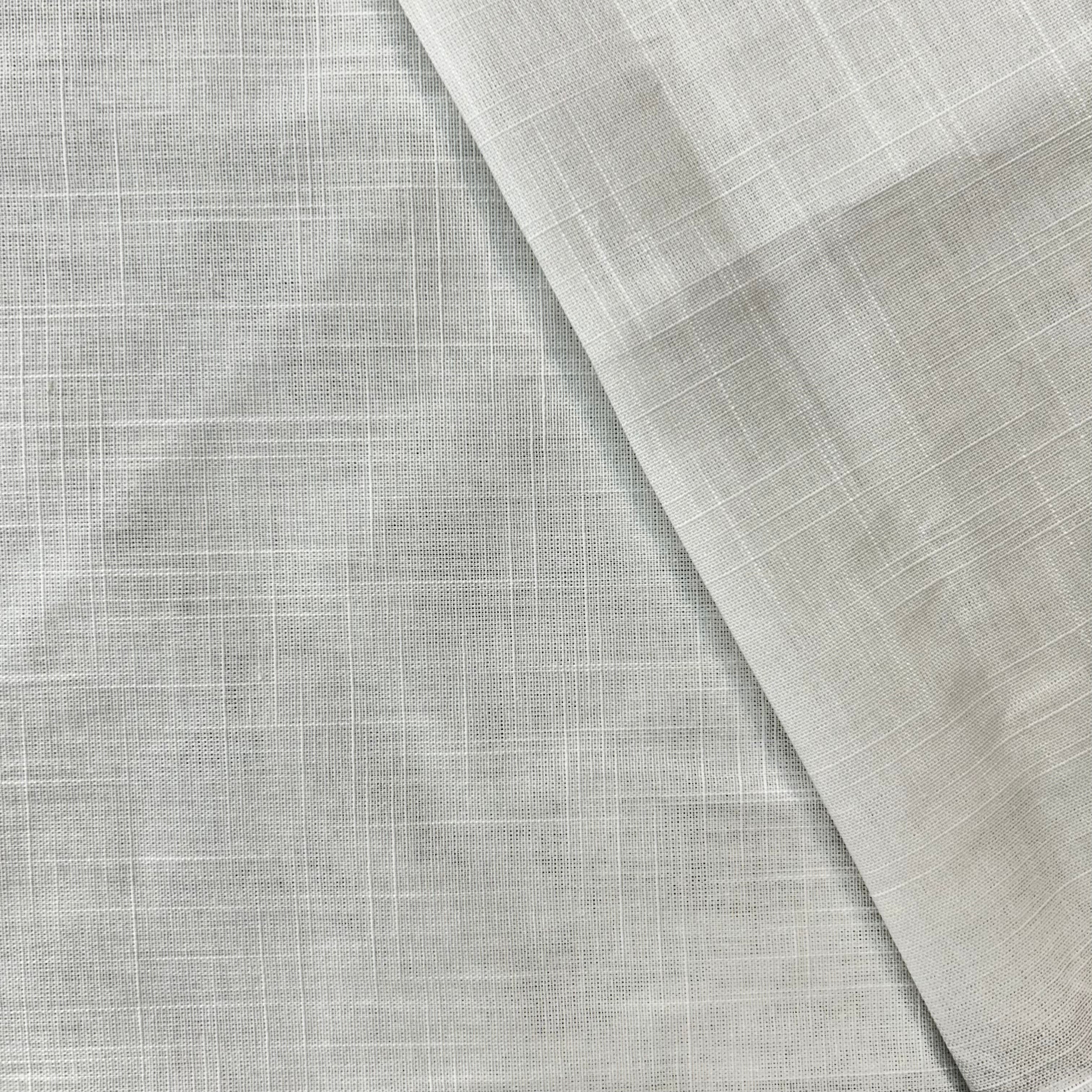 Close-up of gray fabric with a subtle pattern