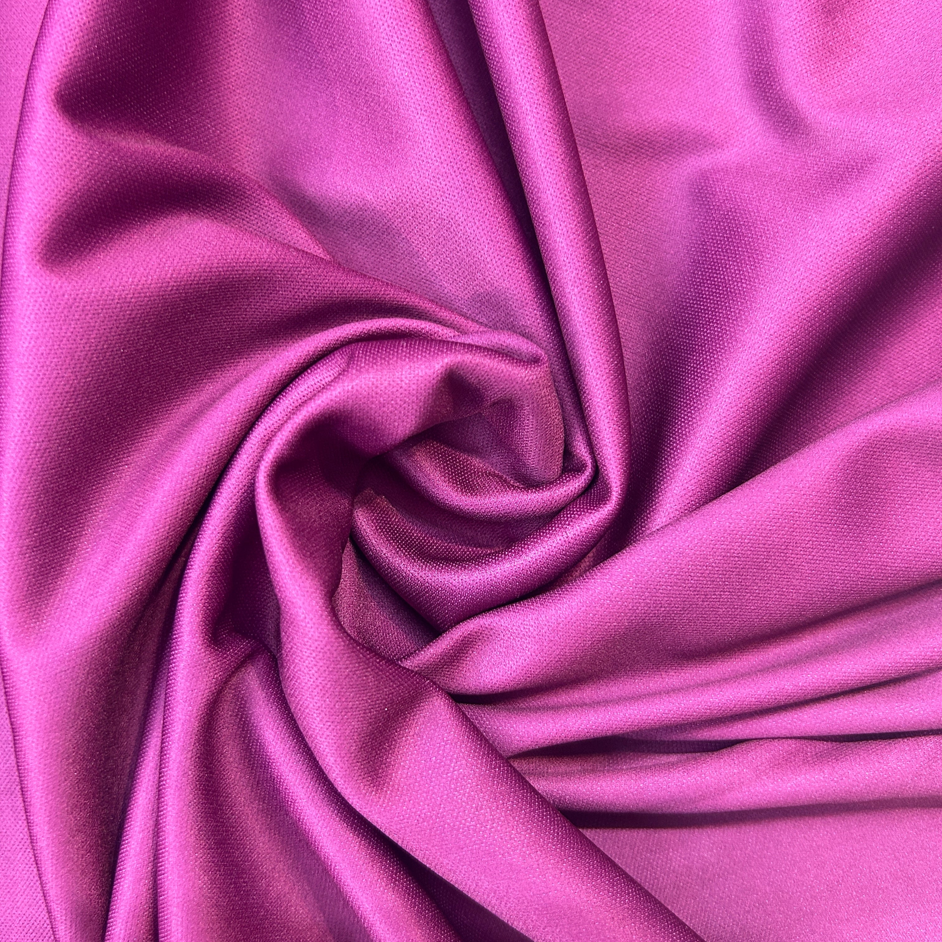 Close-up of purple fabric with folds