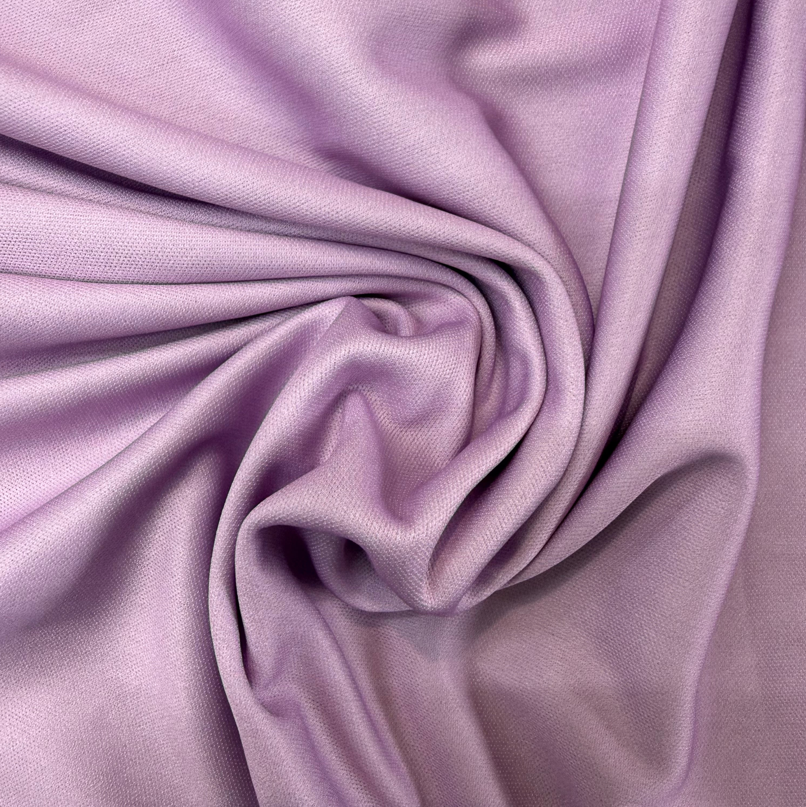 Close-up of purple fabric with folds