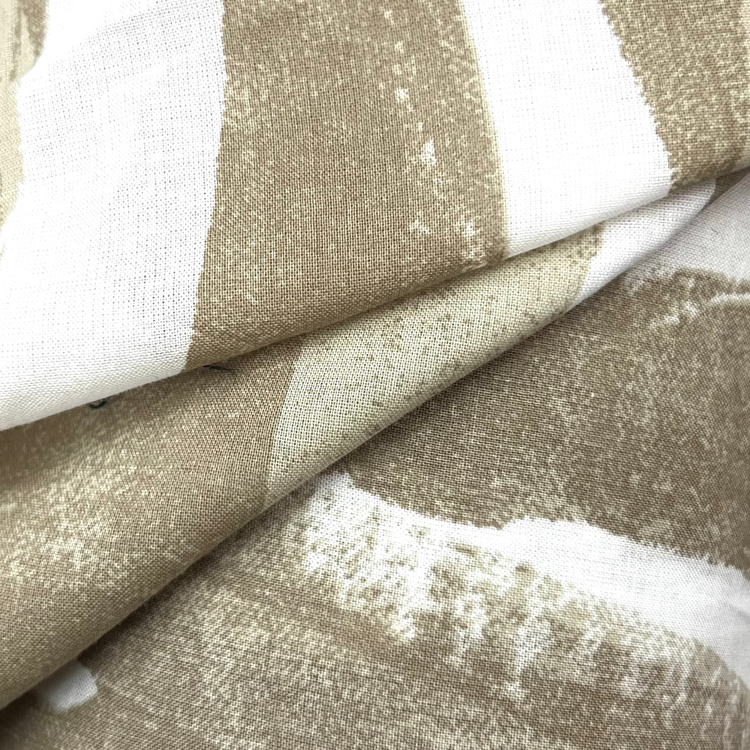 Close-up of beige and white striped fabric