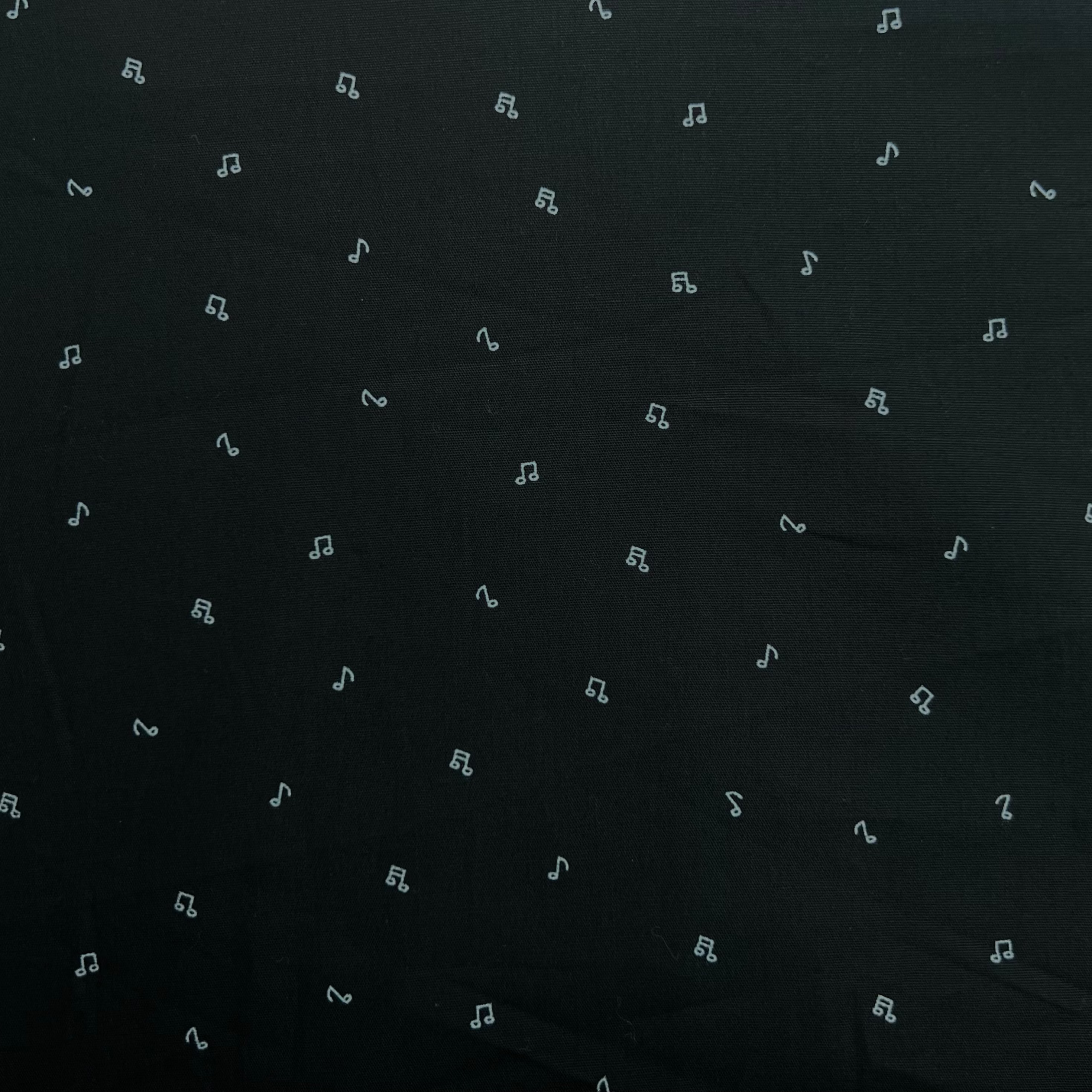 Black fabric with small white pattern