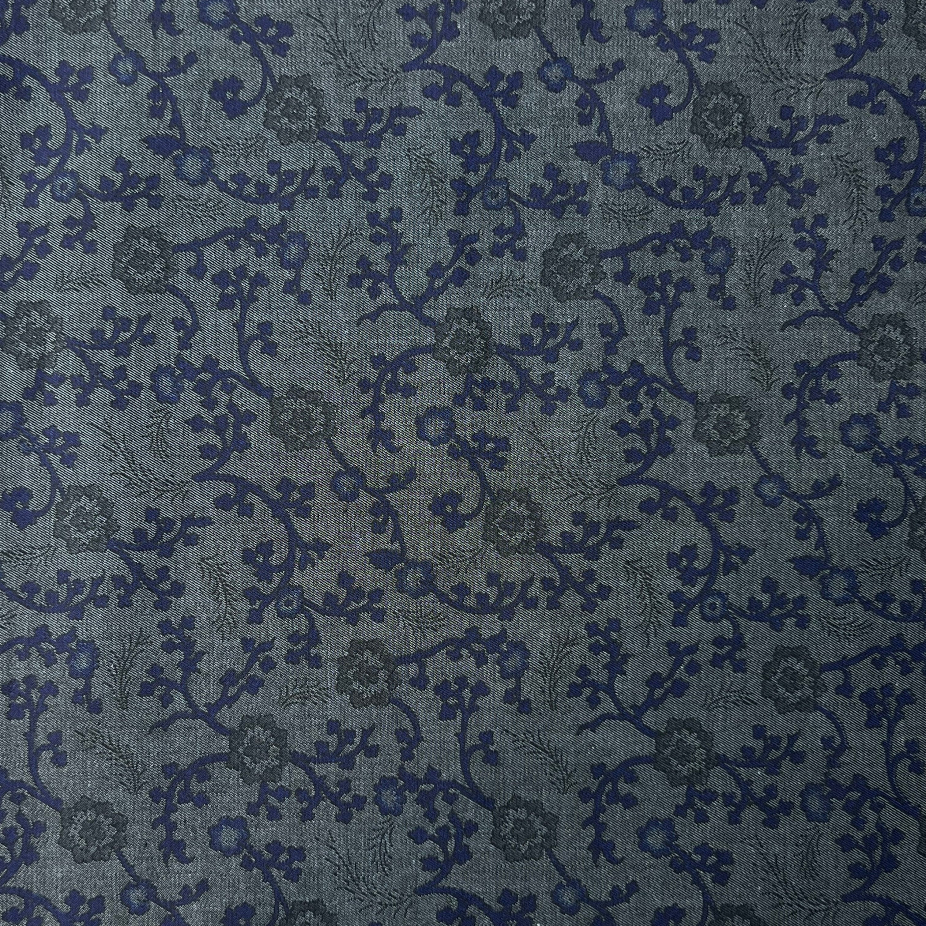 Dark blue fabric with subtle floral pattern