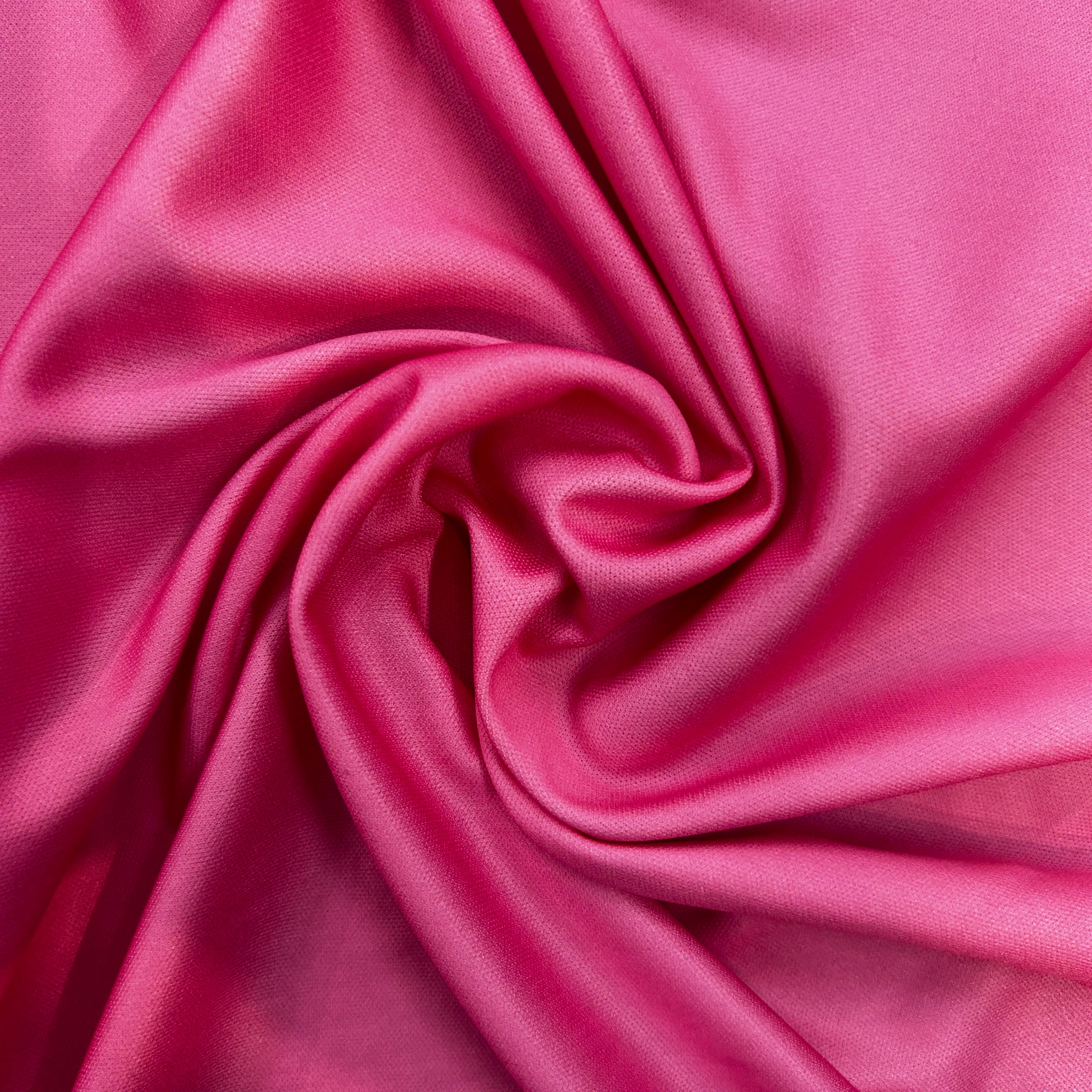 Close-up of pink fabric with folds