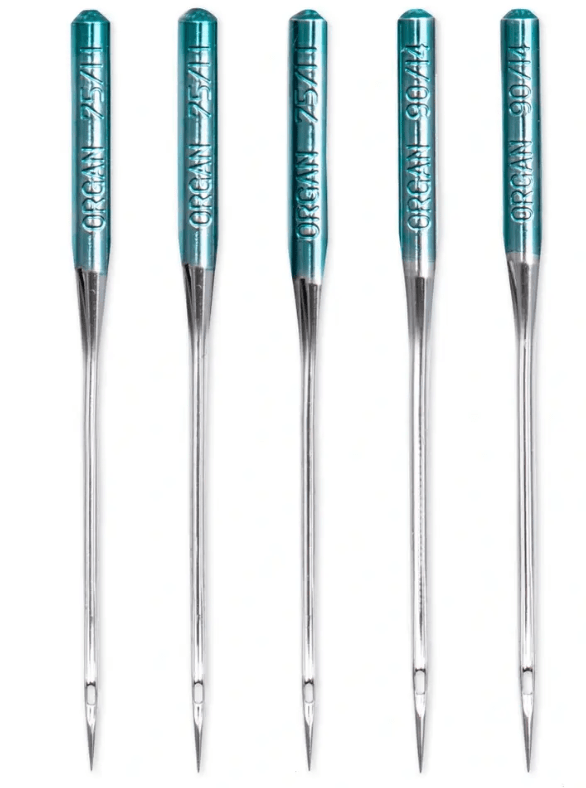 Five silver steel sewing machine needles with teal tops, labeled "ORGAN 75/11" and "ORGAN 90/14".