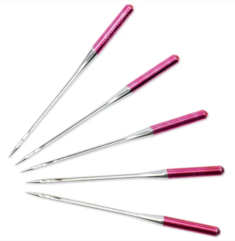 Five steel sewing machine needles with pink tops and wide eyelets.