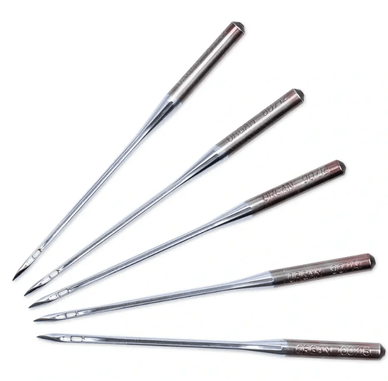 Five assorted silver sewing machine needles for leather.