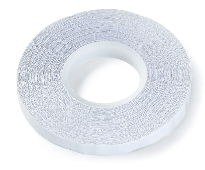 Transparent double-sided wonder tape on a roll.