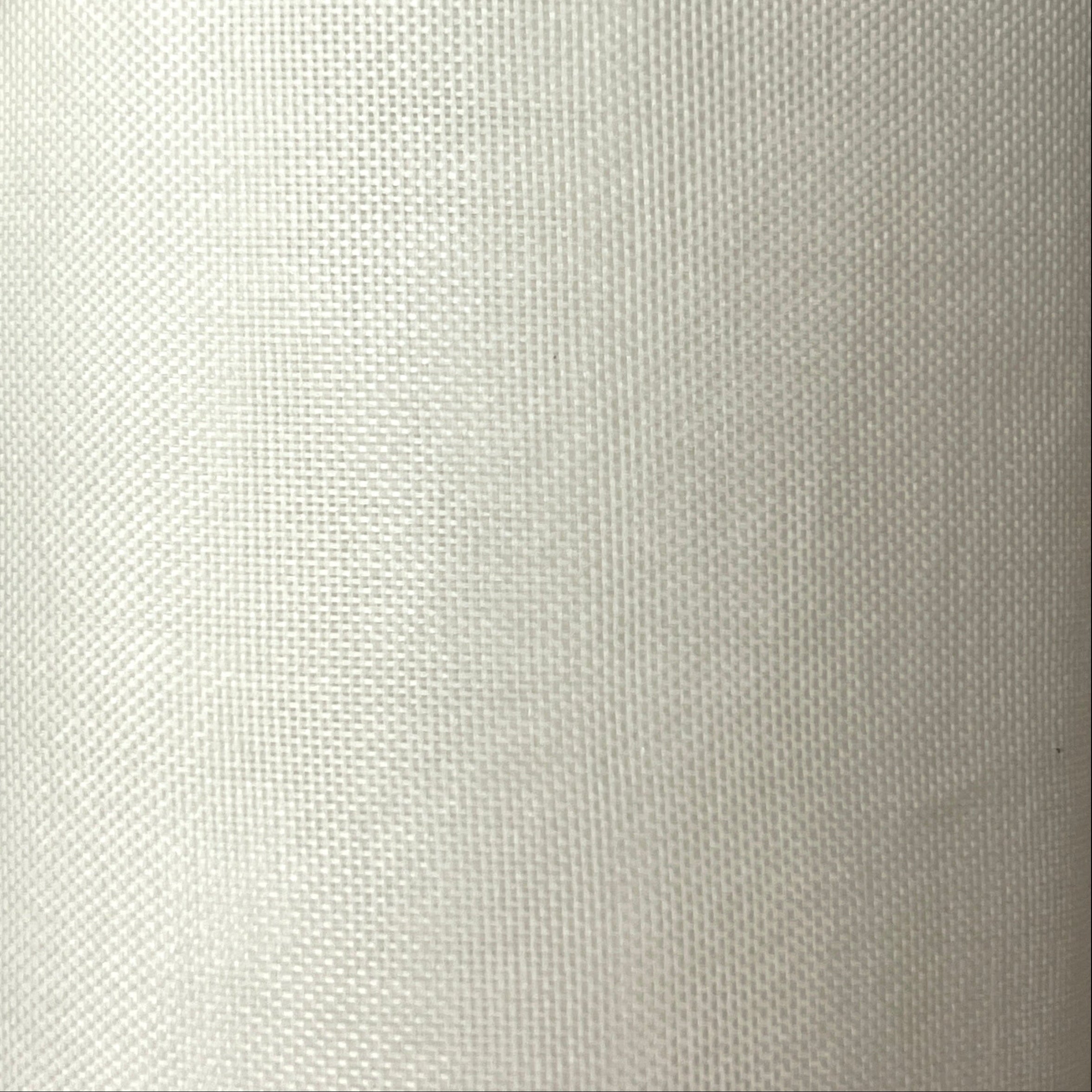 Close-up of a textured white fabric surface