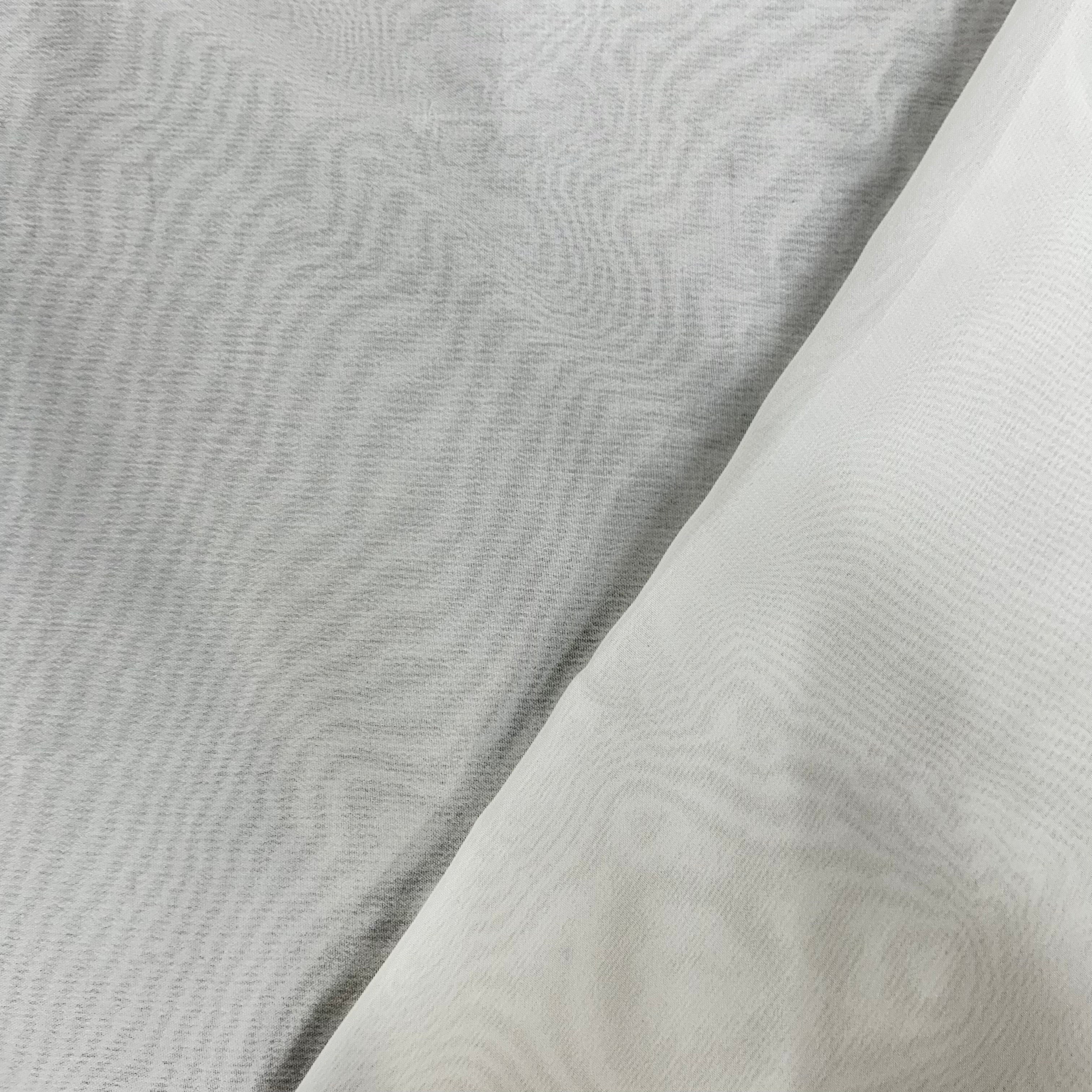 Close-up of textured gray fabric with a slight sheen