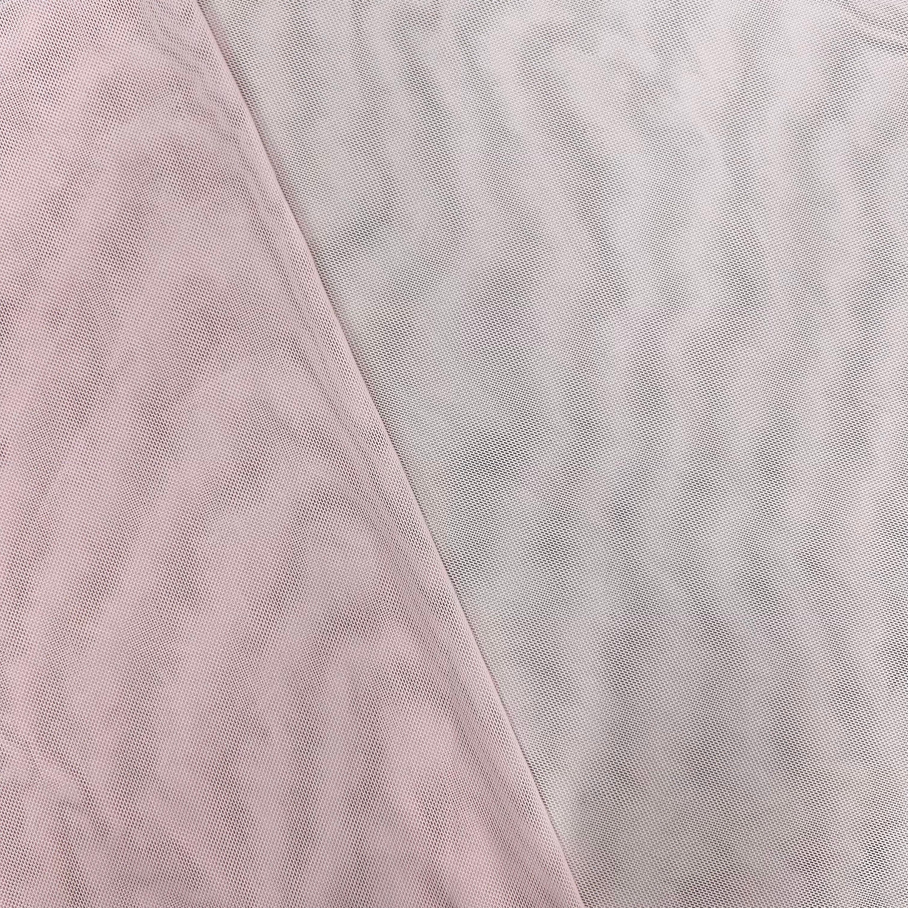 Close-up of light purple fabric texture