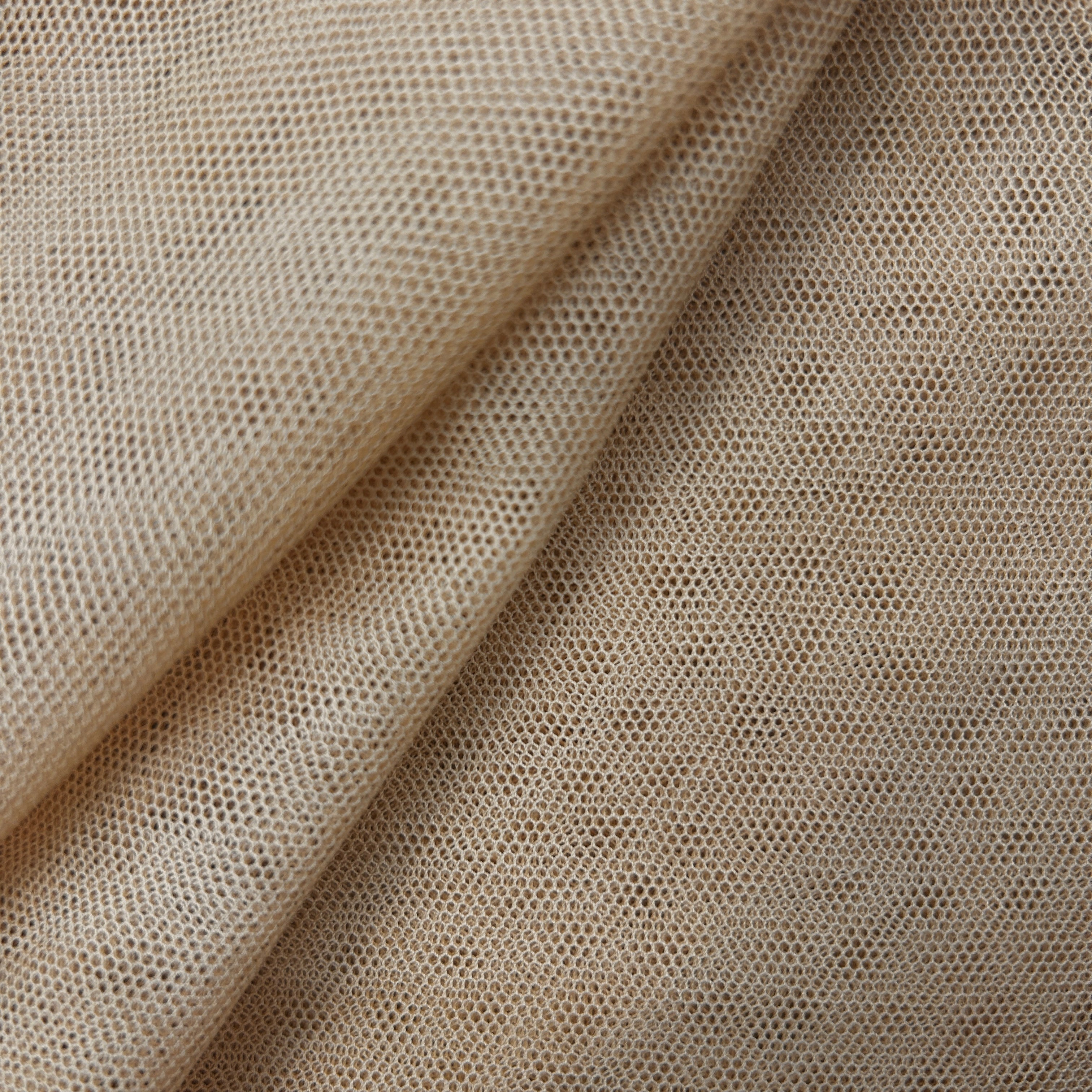 Close-up of beige textured fabric