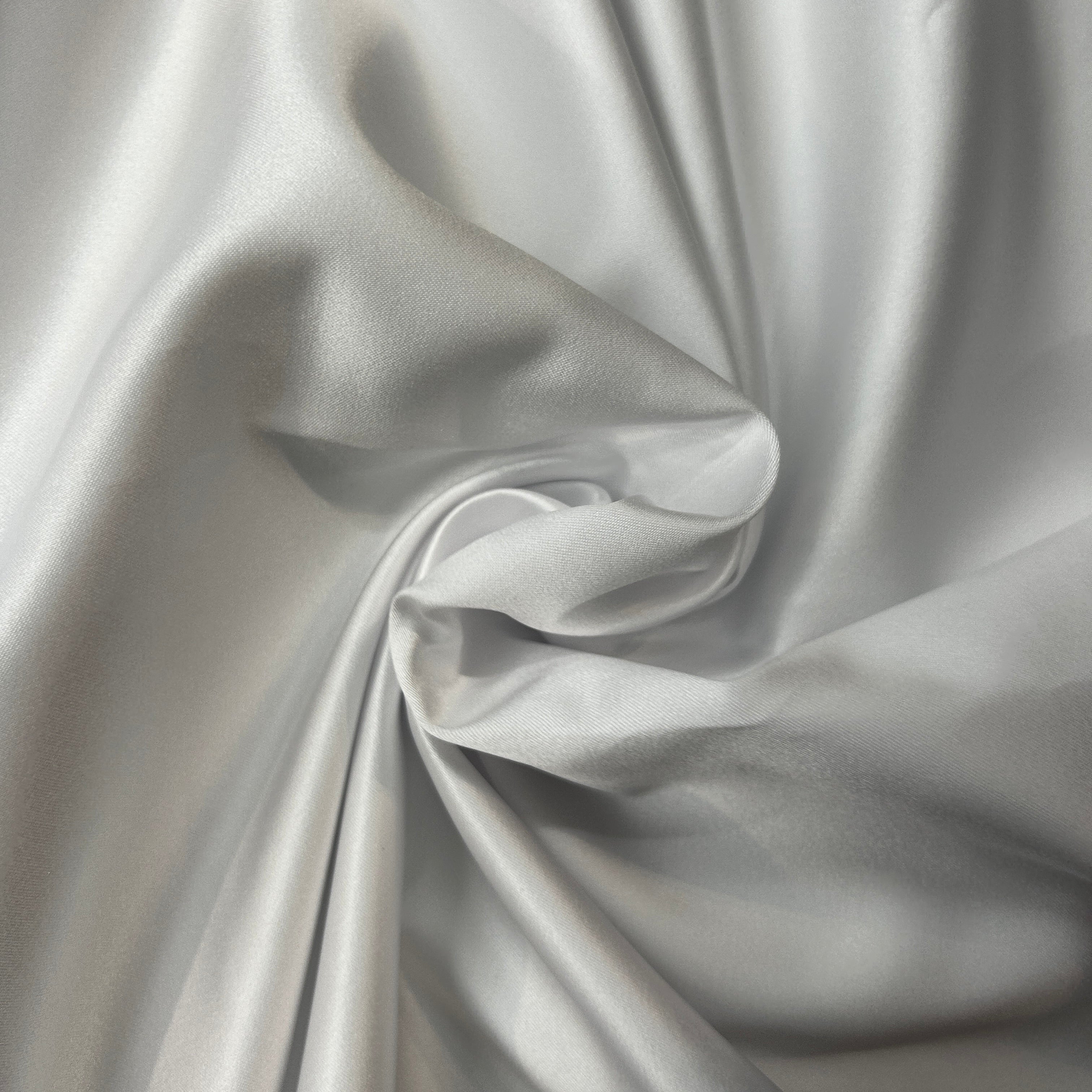 Close-up of silver fabric with folds
