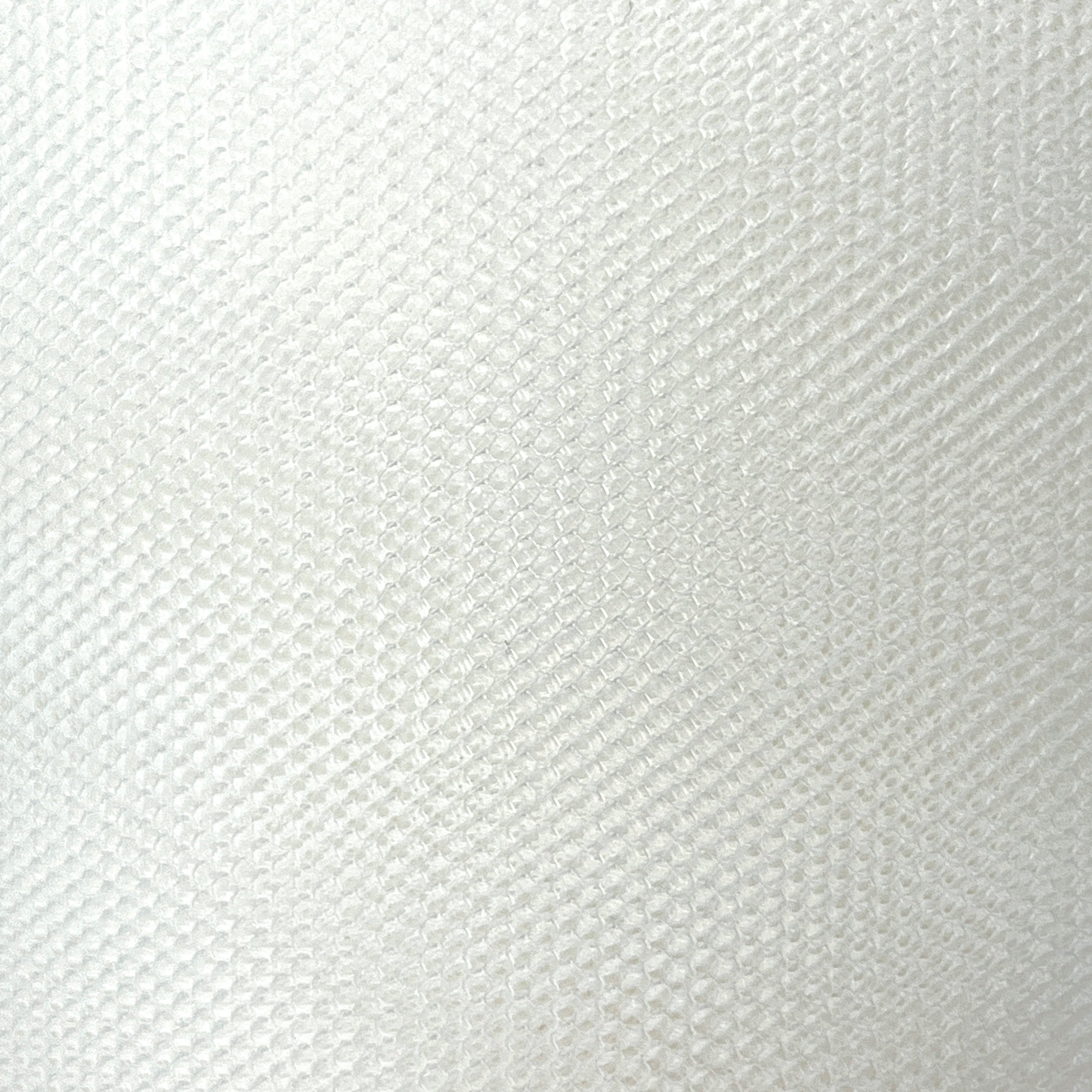 Close-up of a textured white fabric surface